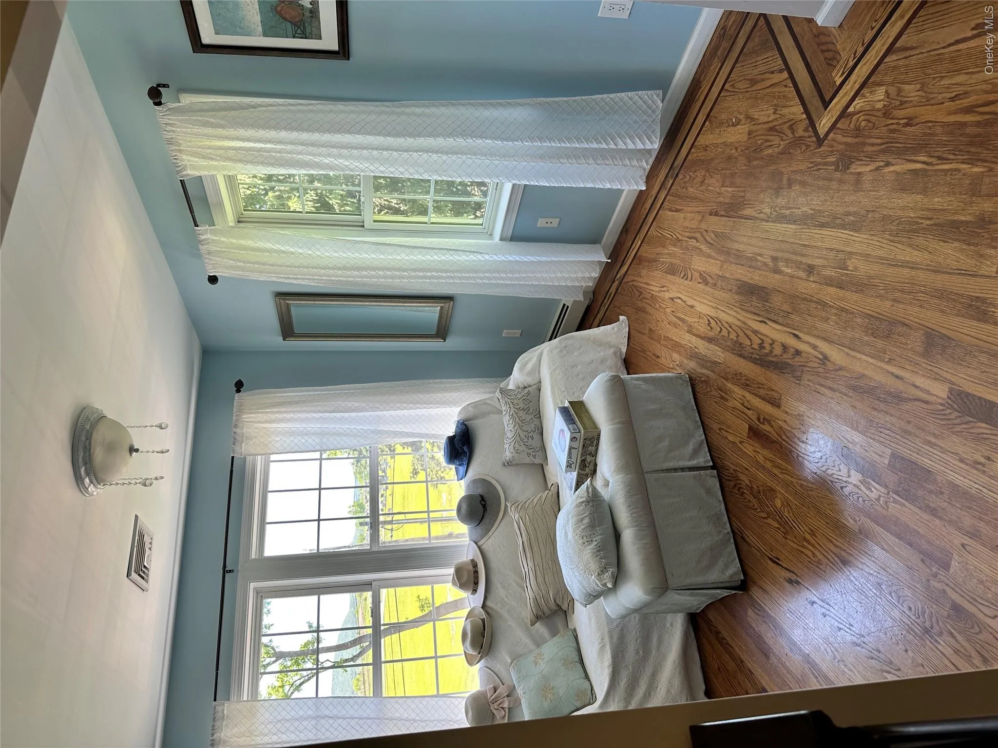 Sitting room in Primary bedroomThese gorgeous floors are throughout the Primary suite and 2nd floor Sitting room in Primary bedroomThese gorgeous floors are throughout the Primary suite and 2nd floor