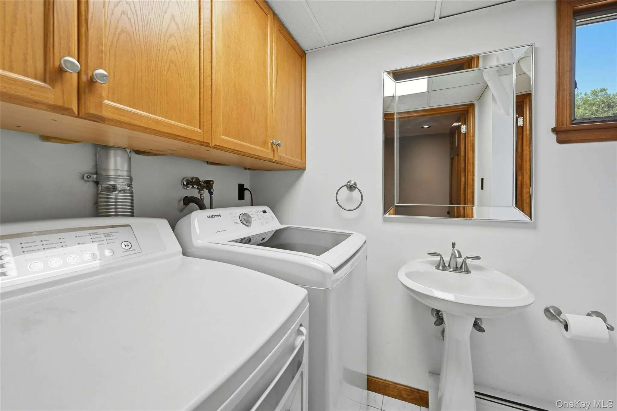 Half Bathroom & Laundry Half Bathroom & Laundry