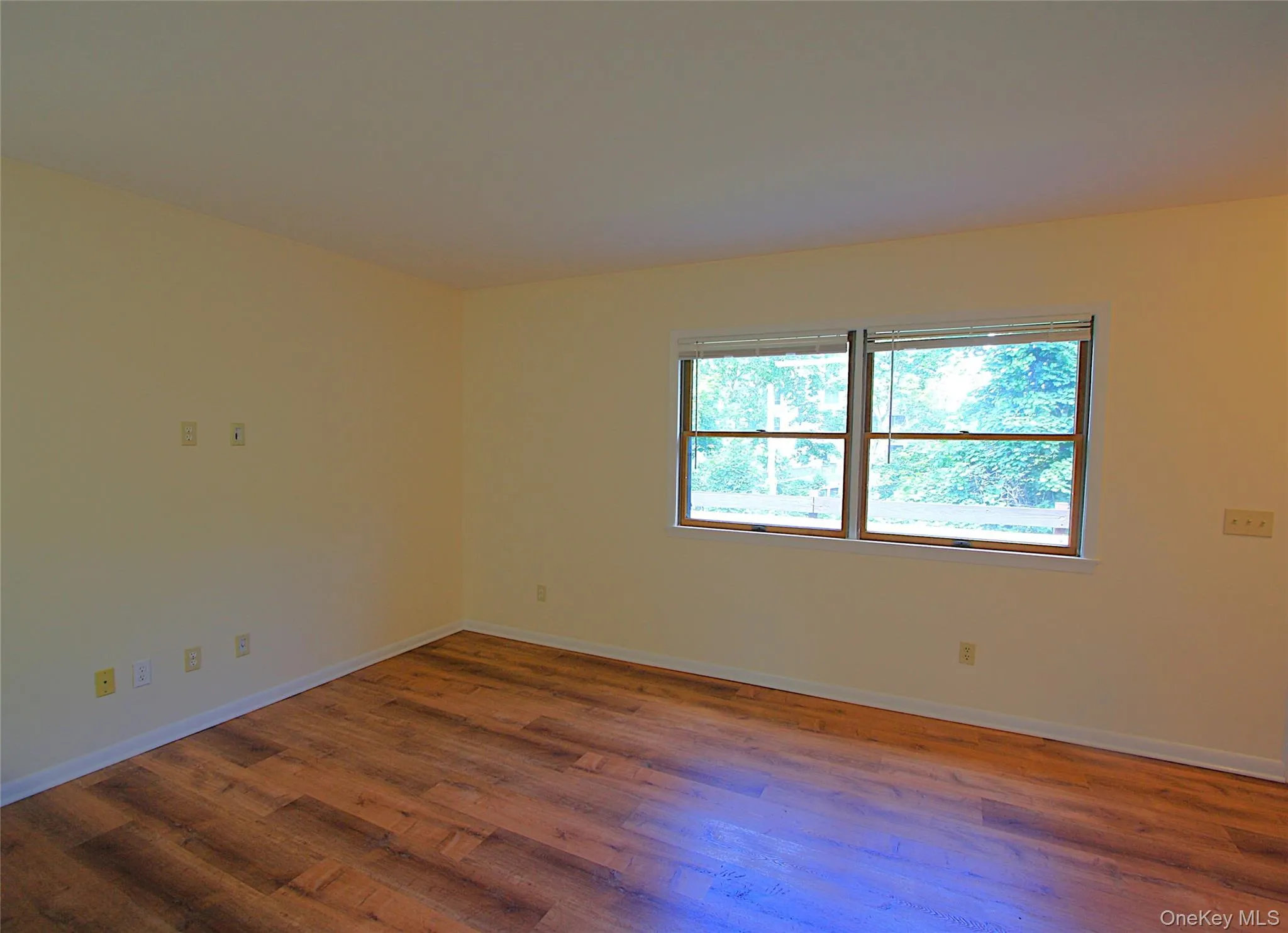 There is plenty of space in the living room for a dining area as well. The floors throughout the unit are new. There is plenty of space in the living room for a dining area as well. The floors throughout the unit are new.