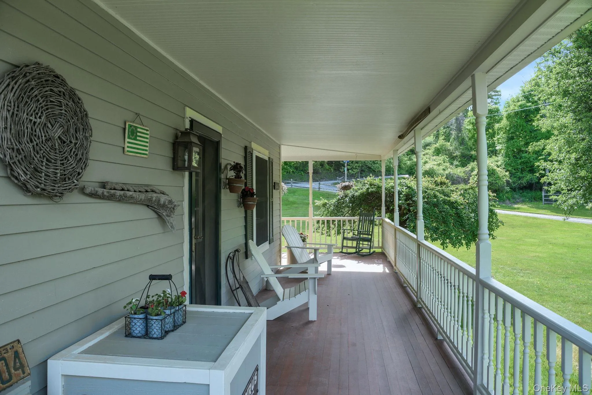 Side porch wrapping around to back deck Side porch wrapping around to back deck