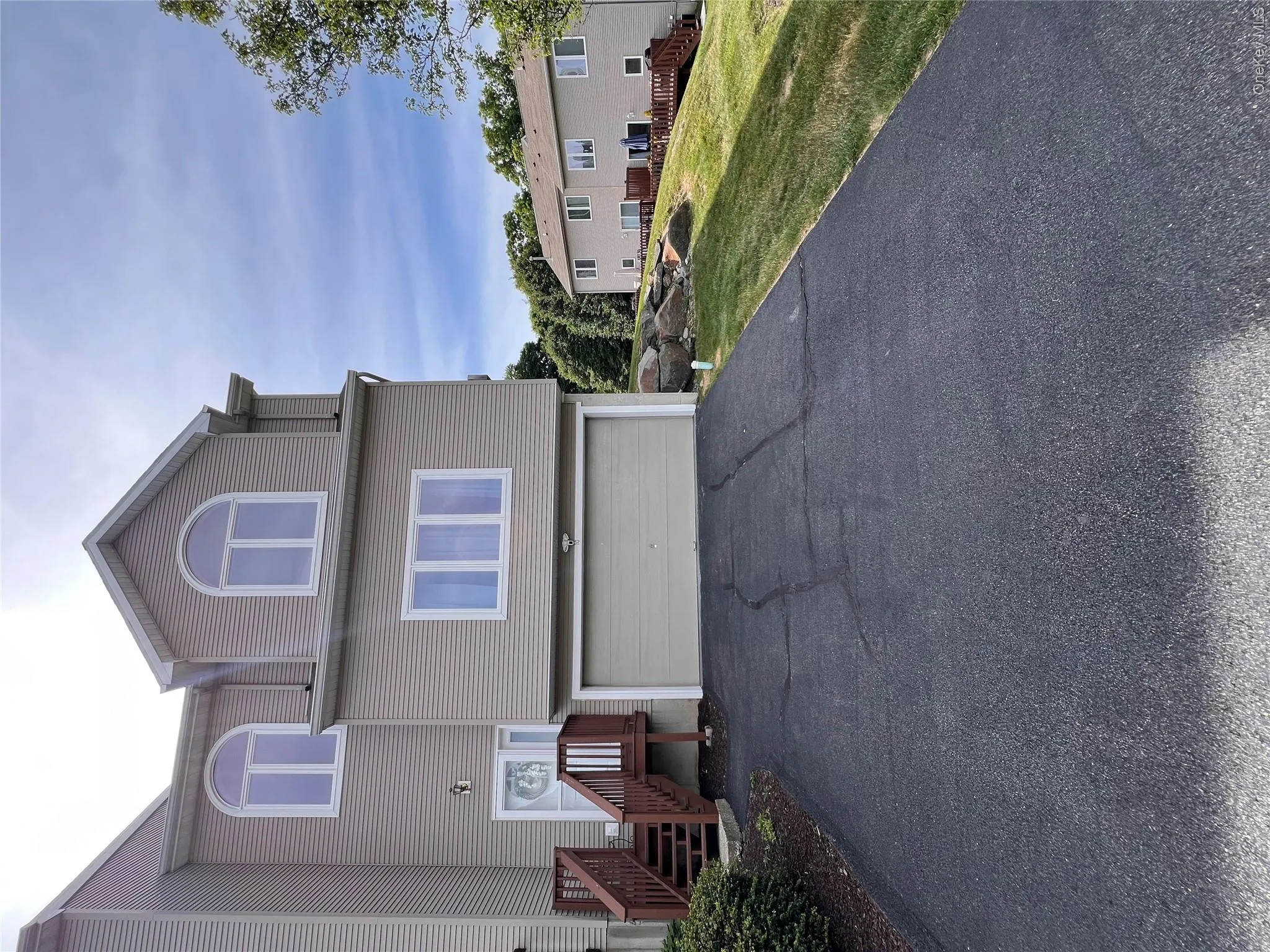 Beautiful Front with 2 car garage and ample driveway fits 4 cars. Beautiful Front with 2 car garage and ample driveway fits 4 cars.