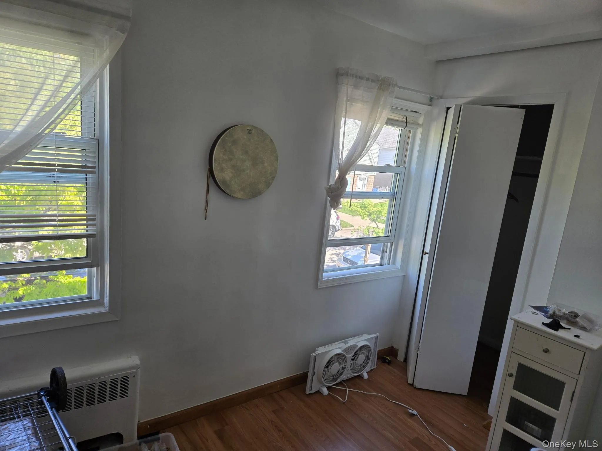Bedroom by Staircase, Photo semi cut off, Front facing with Two windows Bedroom by Staircase, Photo semi cut off, Front facing with Two windows