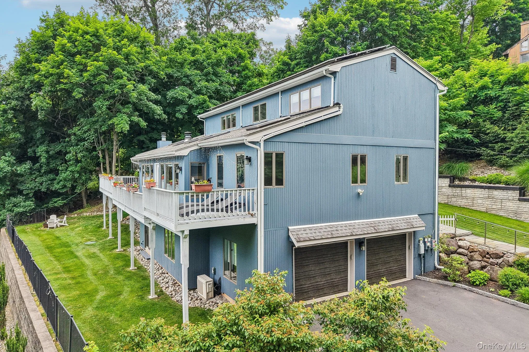 Attached Two Car Garage and additional parking spaces. Attached Two Car Garage and additional parking spaces.