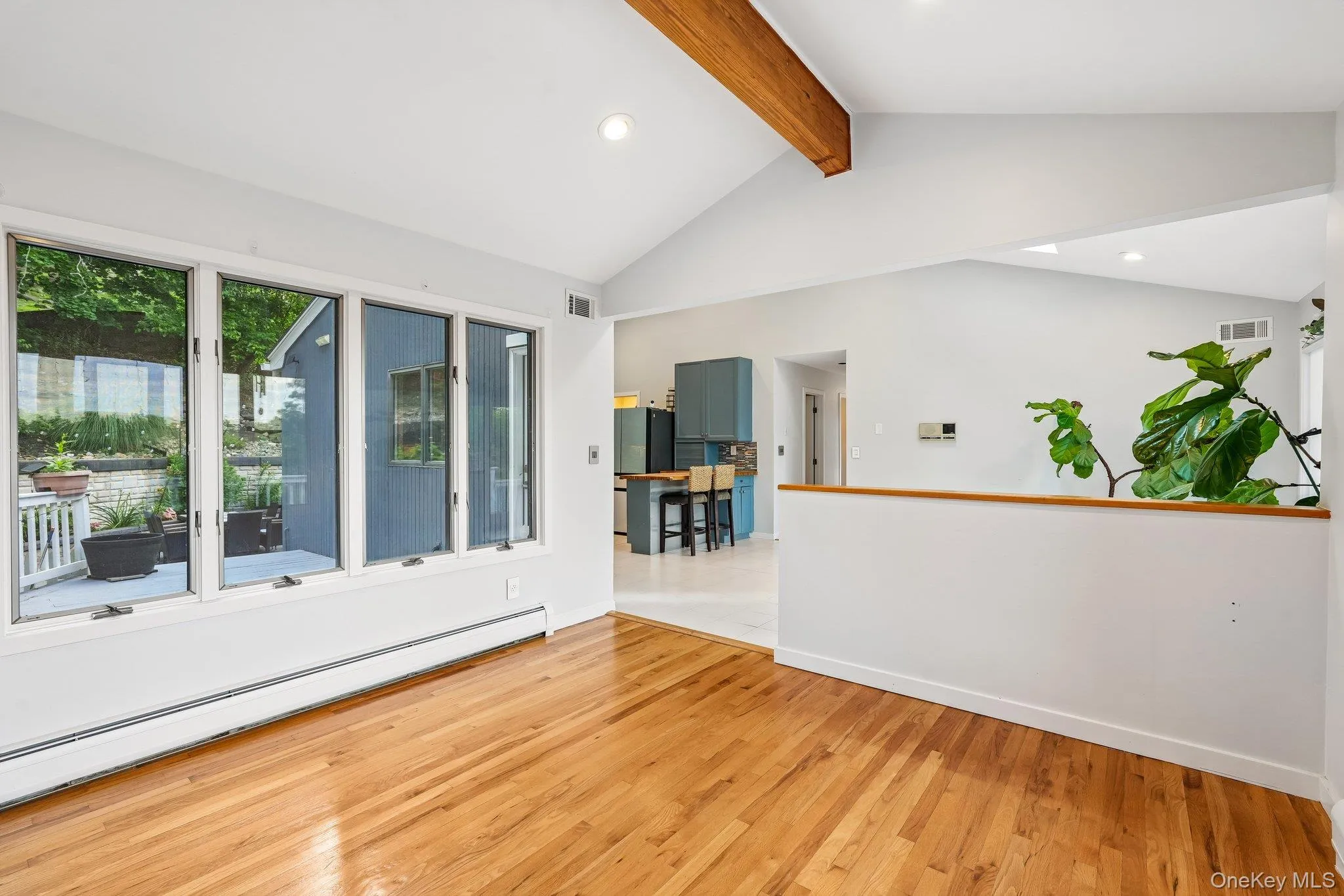 A cozy family room adjacent to the kitchen. A cozy family room adjacent to the kitchen.