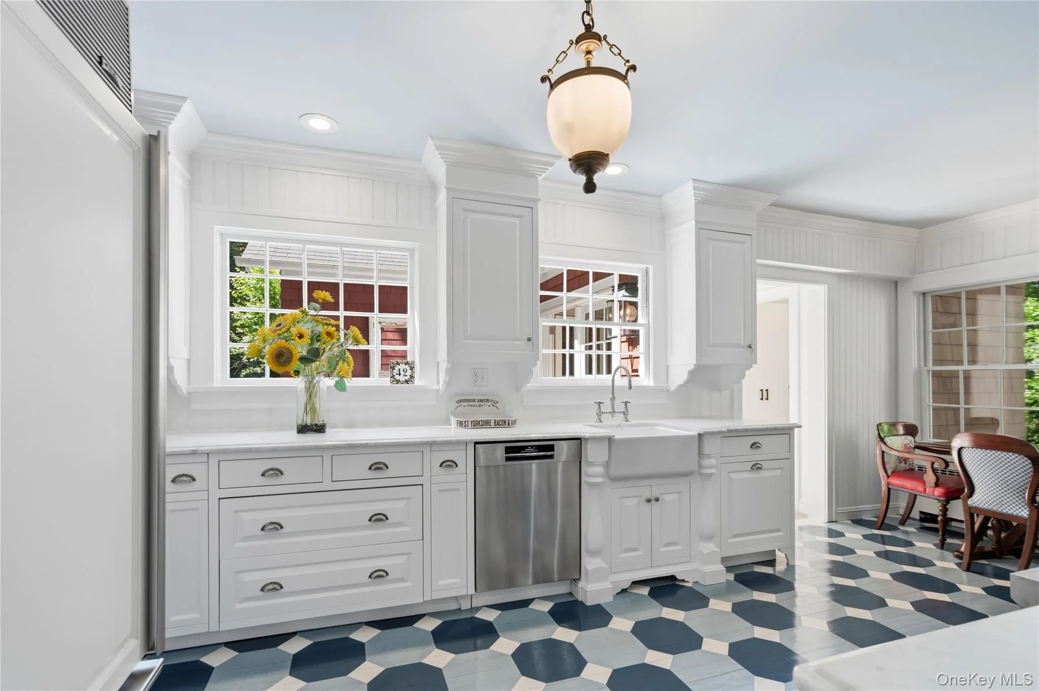 Exciting chef's kitchen with painted wood floors Exciting chef's kitchen with painted wood floors