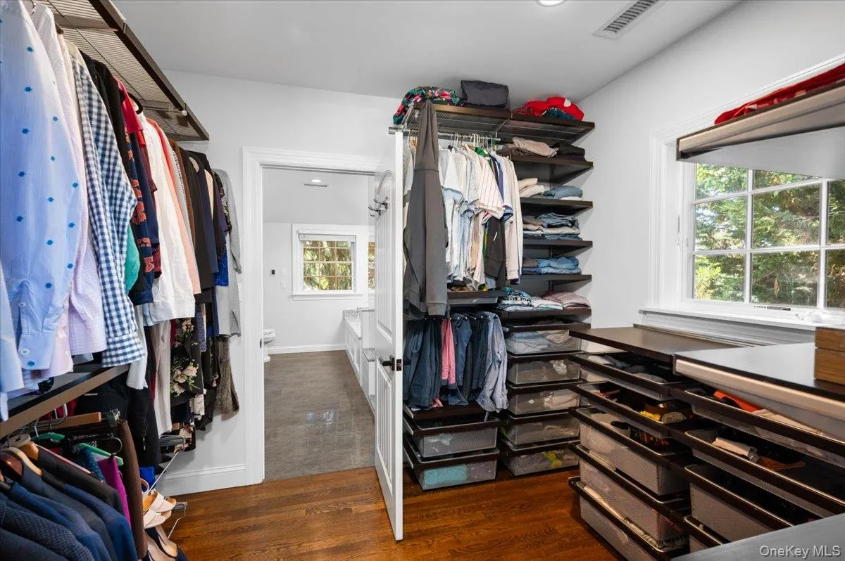 Primary Bedroom Walk-in-Closet Primary Bedroom Walk-in-Closet