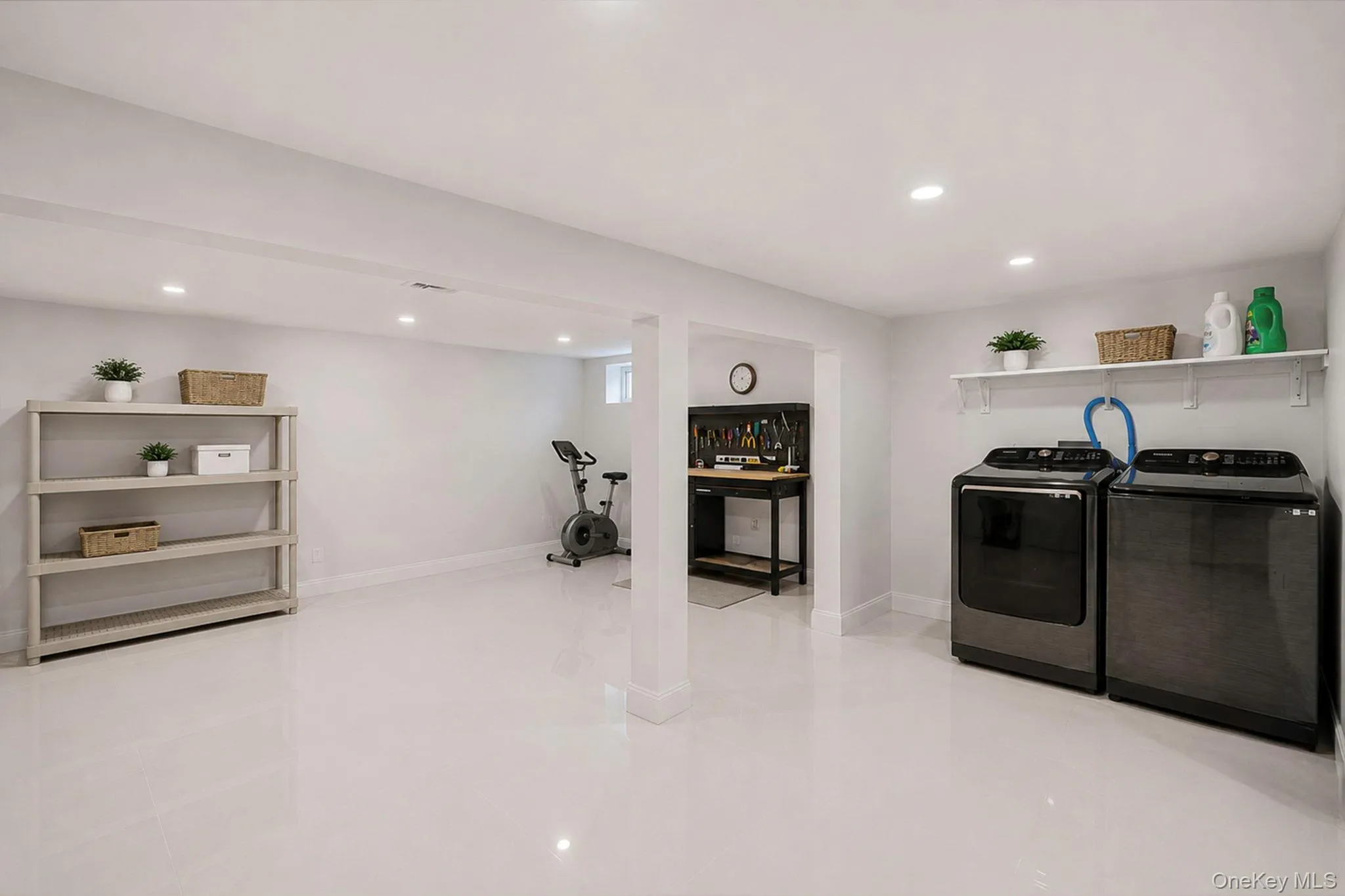 Partial, finished basement with laundry area, storage closets, recessed lighting, tile floors Partial, finished basement with laundry area, storage closets, recessed lighting, tile floors