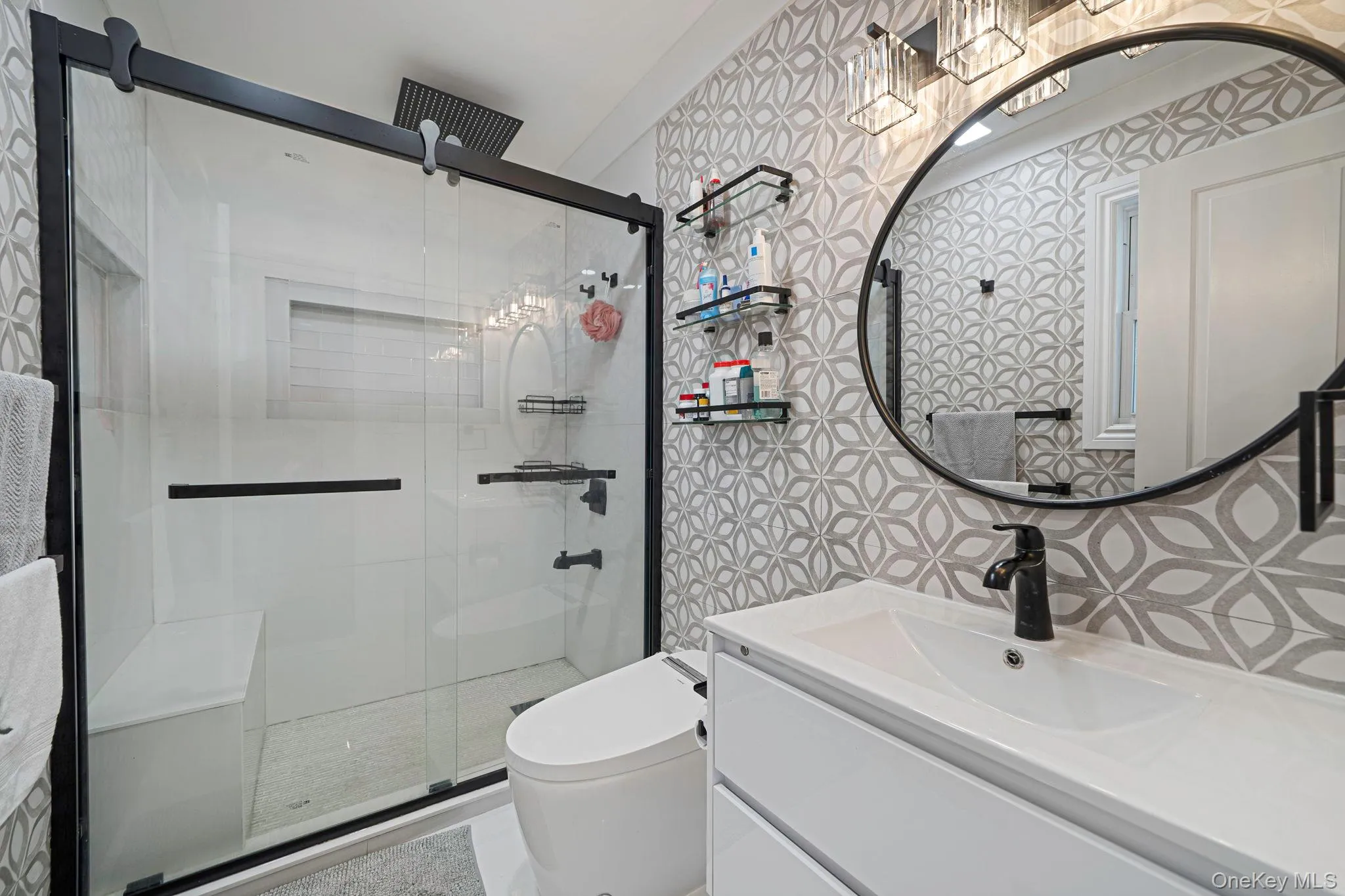 Renovated full bathroom with high end features. Renovated full bathroom with high end features.