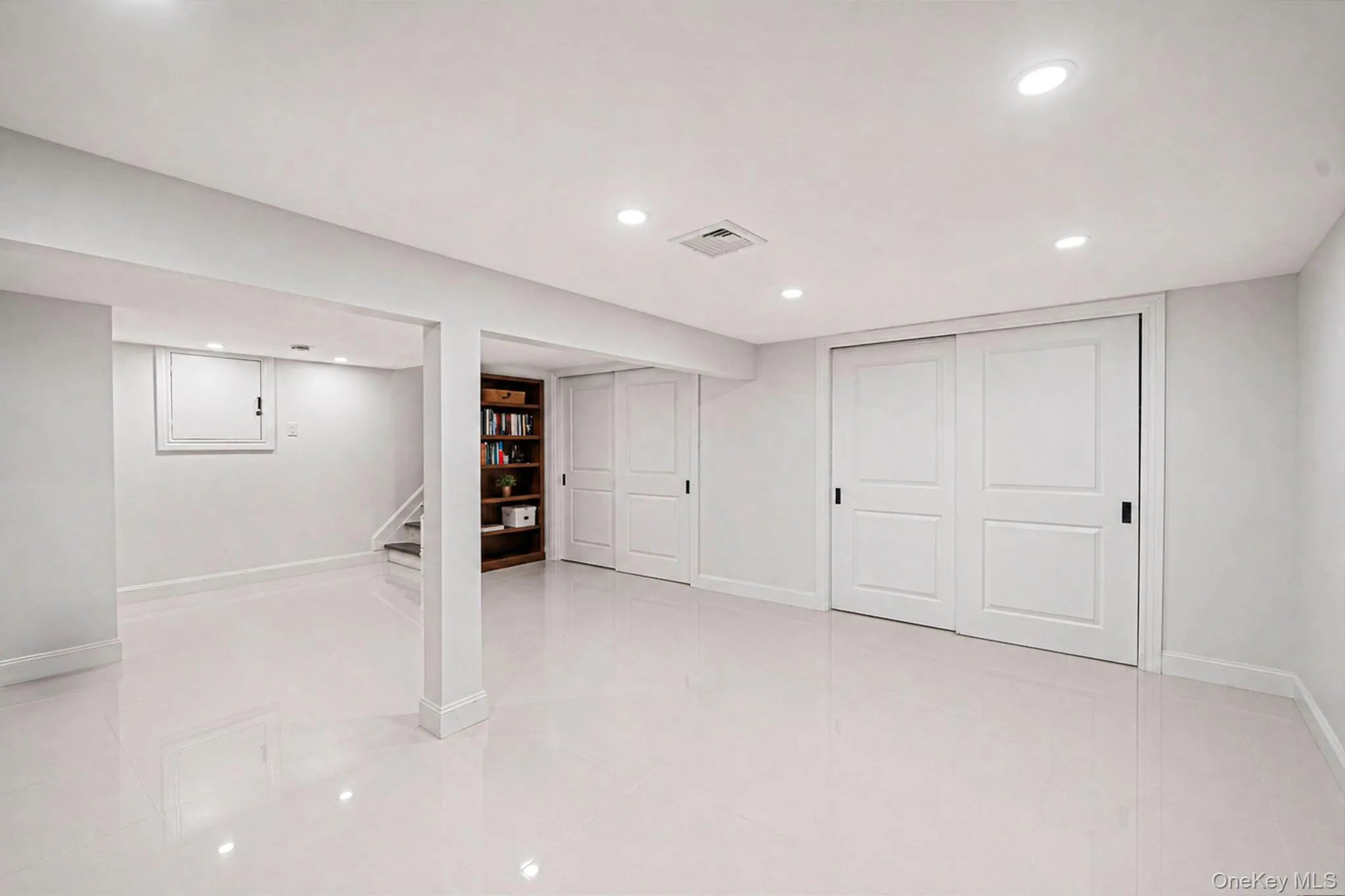 Partial, finished basement with laundry area, storage closets, recessed lighting, tile floors Partial, finished basement with laundry area, storage closets, recessed lighting, tile floors