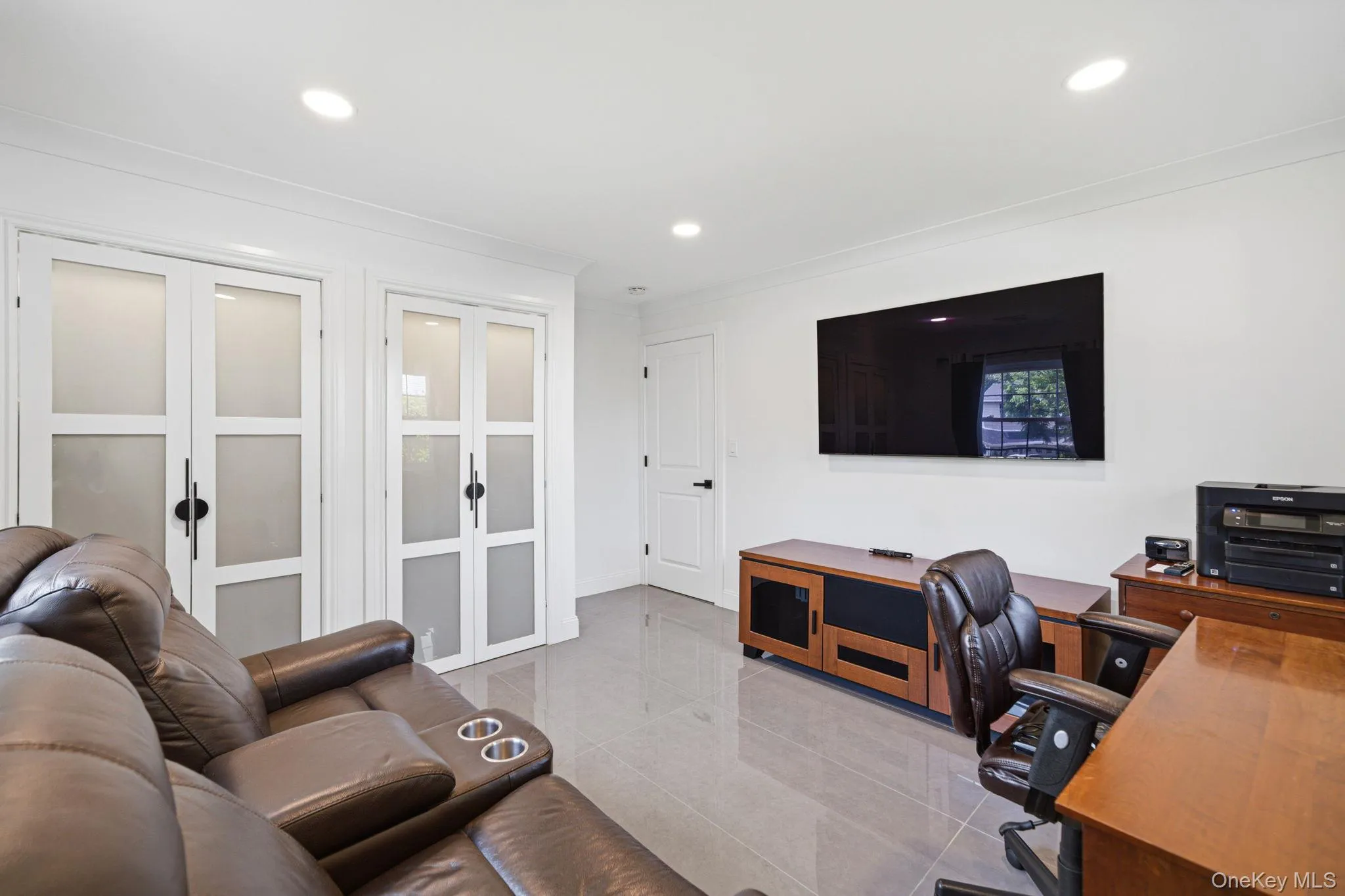 Bedroom features 2 windows, recessed lighting, porcelain tile floors, a custom closet. Bedroom features 2 windows, recessed lighting, porcelain tile floors, a custom closet.