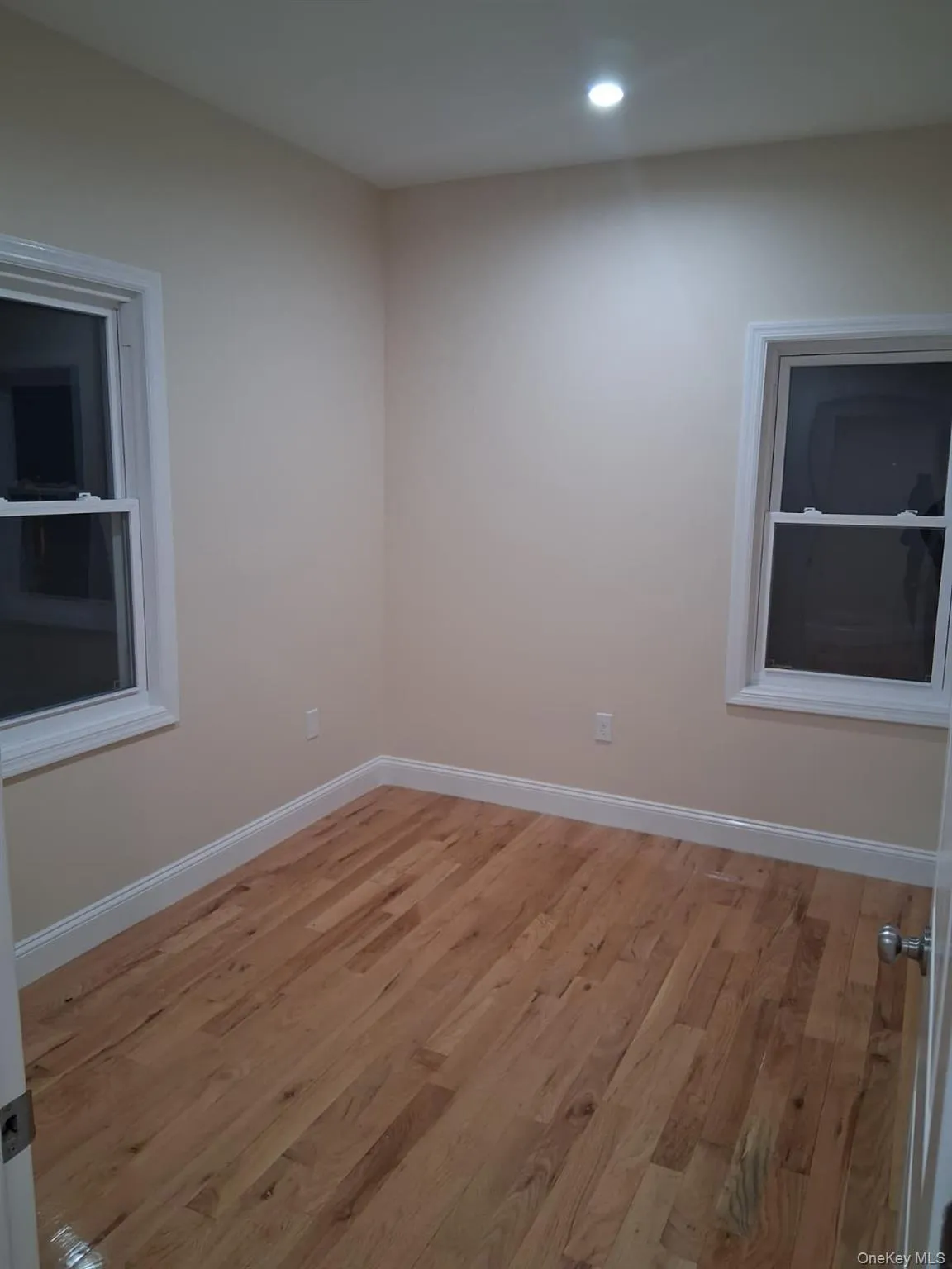 Spare room with light wood-style floors and recessed lighting Spare room with light wood-style floors and recessed lighting