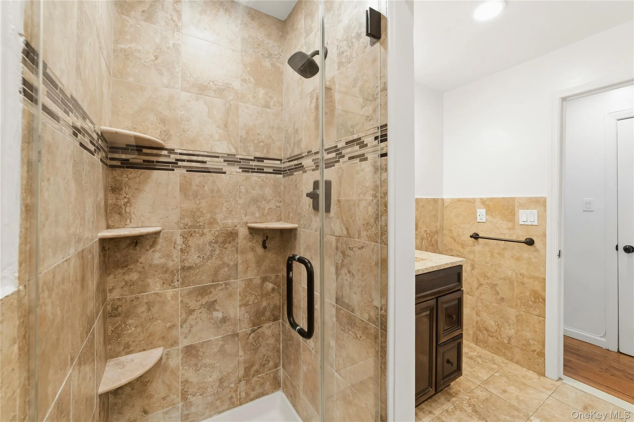 Primary Bath Features: Renovated 2017, Massive Linen Closet, Sleek Modern Lighting & Fixtures Primary Bath Features: Renovated 2017, Massive Linen Closet, Sleek Modern Lighting & Fixtures