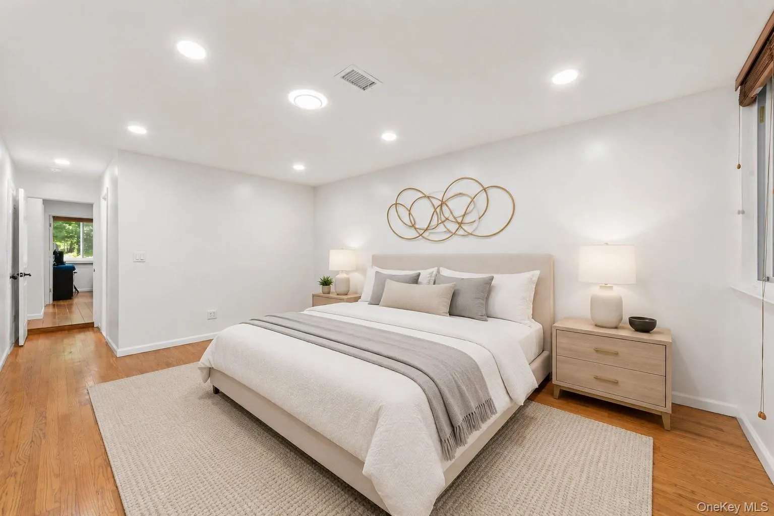 *Virtually Staged* Primary Bedroom Features: Full Bath, Wall-to-Wall Windows, Walk-In Closet with Custom closet Design *Virtually Staged* Primary Bedroom Features: Full Bath, Wall-to-Wall Windows, Walk-In Closet with Custom closet Design