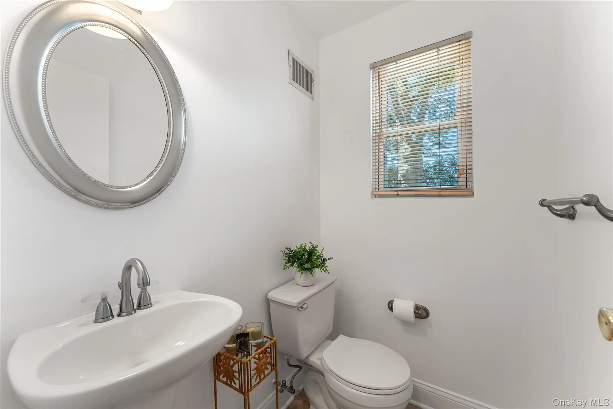 Half bath off of kitchen Half bath off of kitchen