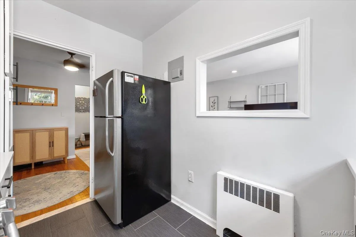 Kitchen has a pass-through window to the Living Room/Dining Room Kitchen has a pass-through window to the Living Room/Dining Room