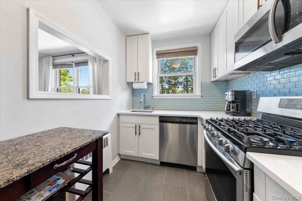 Attractive white cabinetry Attractive white cabinetry