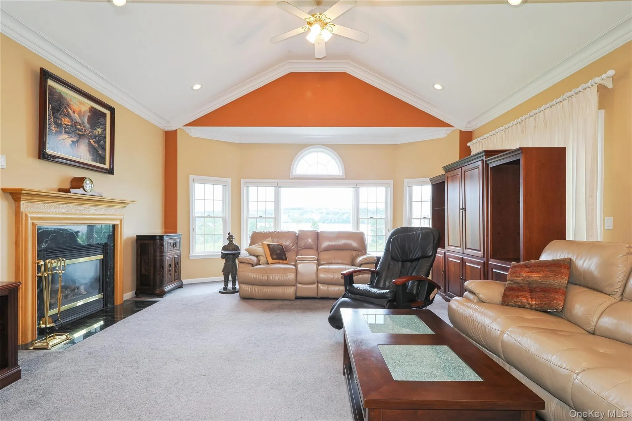 Gas Fireplace, Full wall of windows. Gas Fireplace, Full wall of windows.