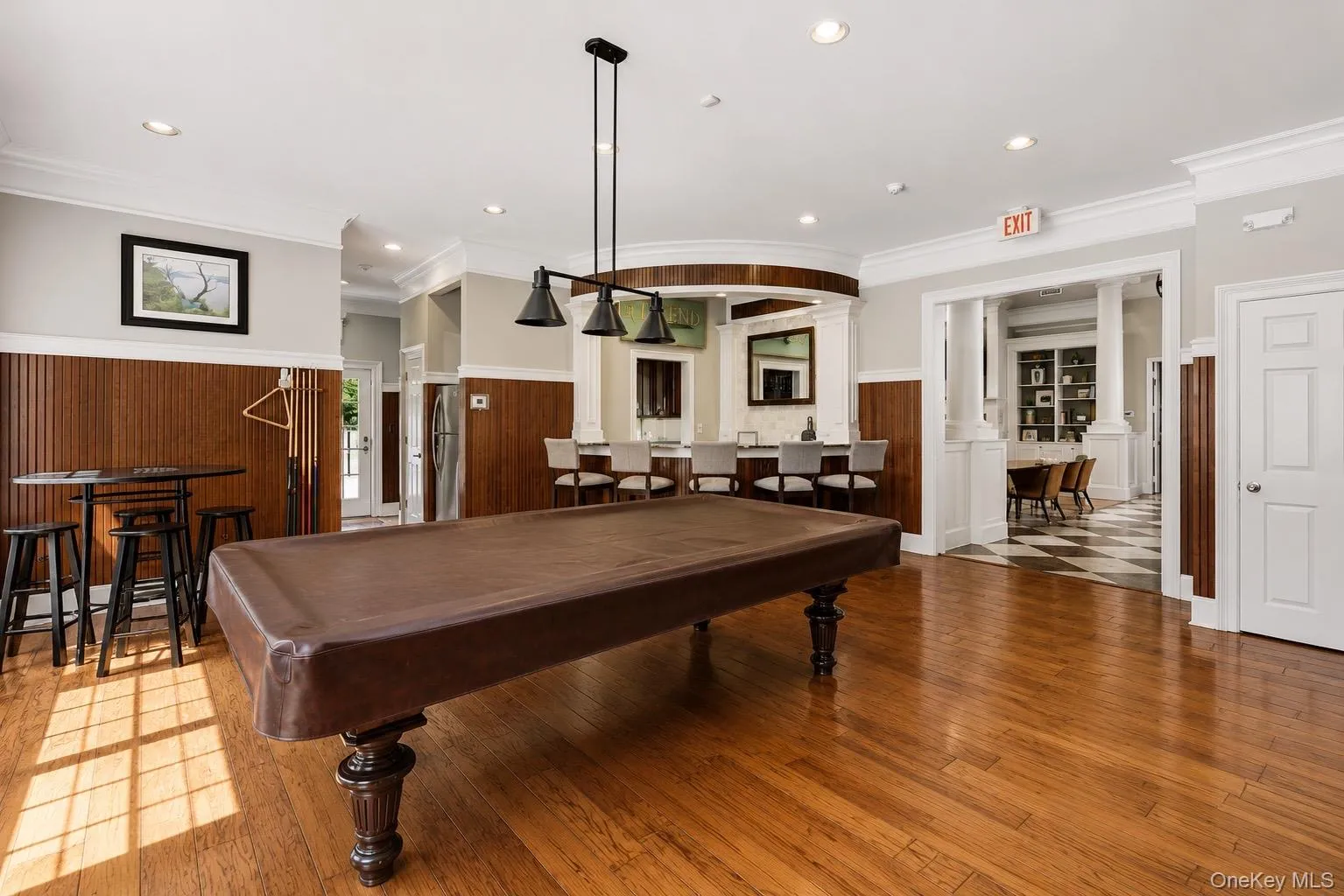 Spacious recreation area in the clubhouse with billiard table and bar area. Spacious recreation area in the clubhouse with billiard table and bar area.