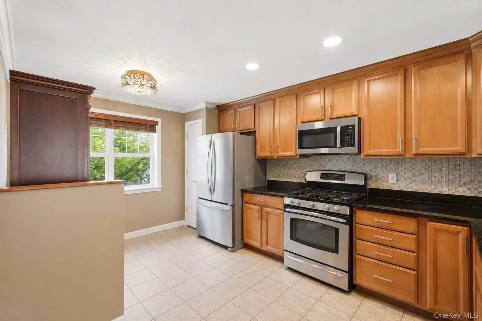 Eat-in-kitchen. Dining area is currently occupied by an armoire. Eat-in-kitchen. Dining area is currently occupied by an armoire.