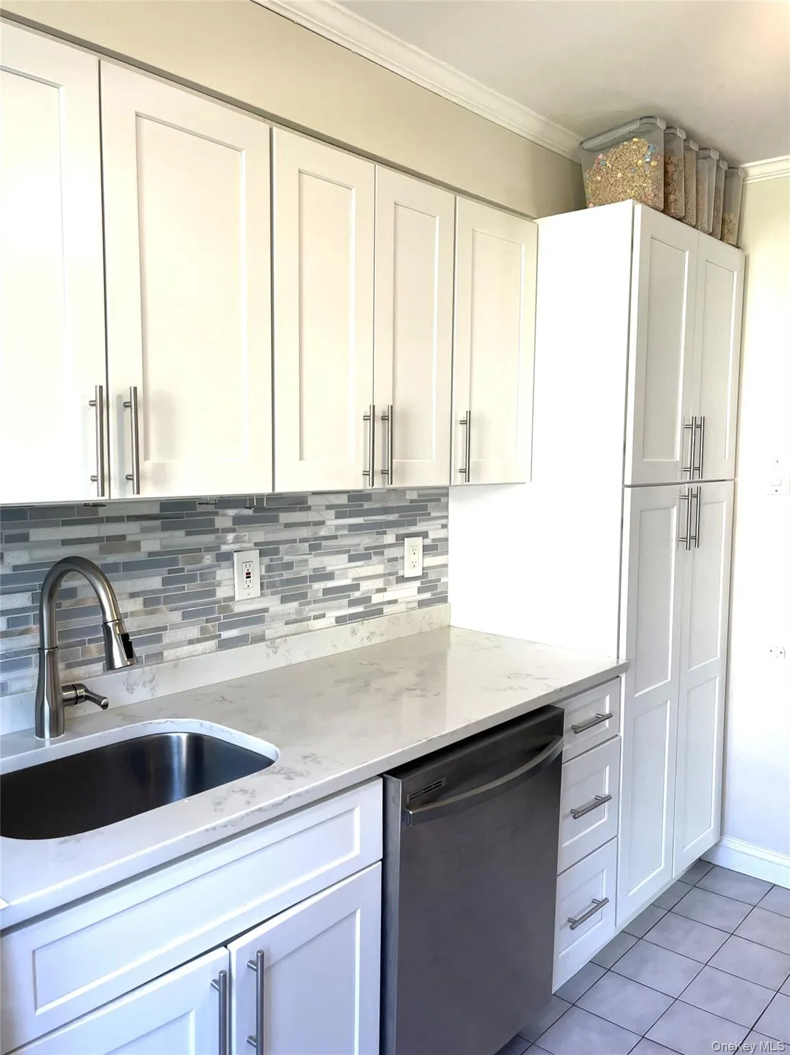 Kitchen with stainless steel undermount sink Kitchen with stainless steel undermount sink