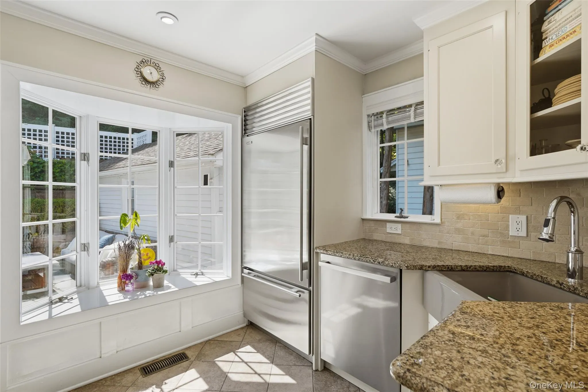 Kitchen with bay window and stainless steal appliances. Kitchen with bay window and stainless steal appliances.