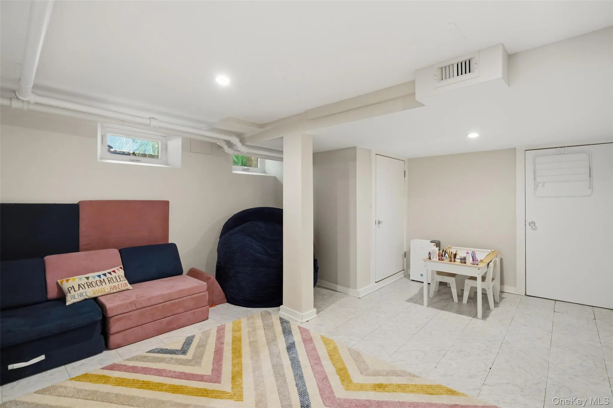 Basement with laundry and utility room. Basement with laundry and utility room.