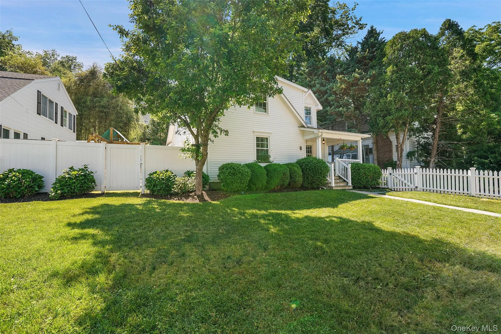 Fenced in front yard. Fenced in front yard.