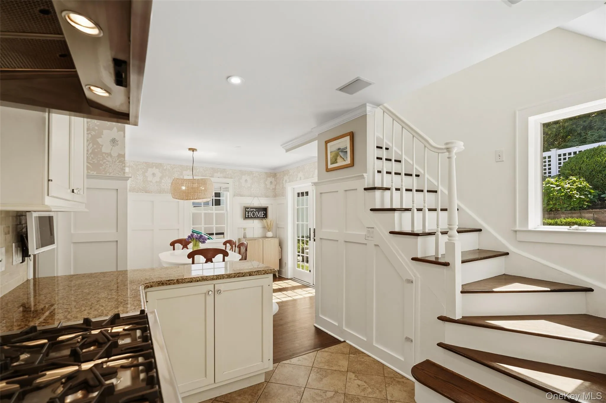 Kitchen with stairs to second floor. Kitchen with stairs to second floor.