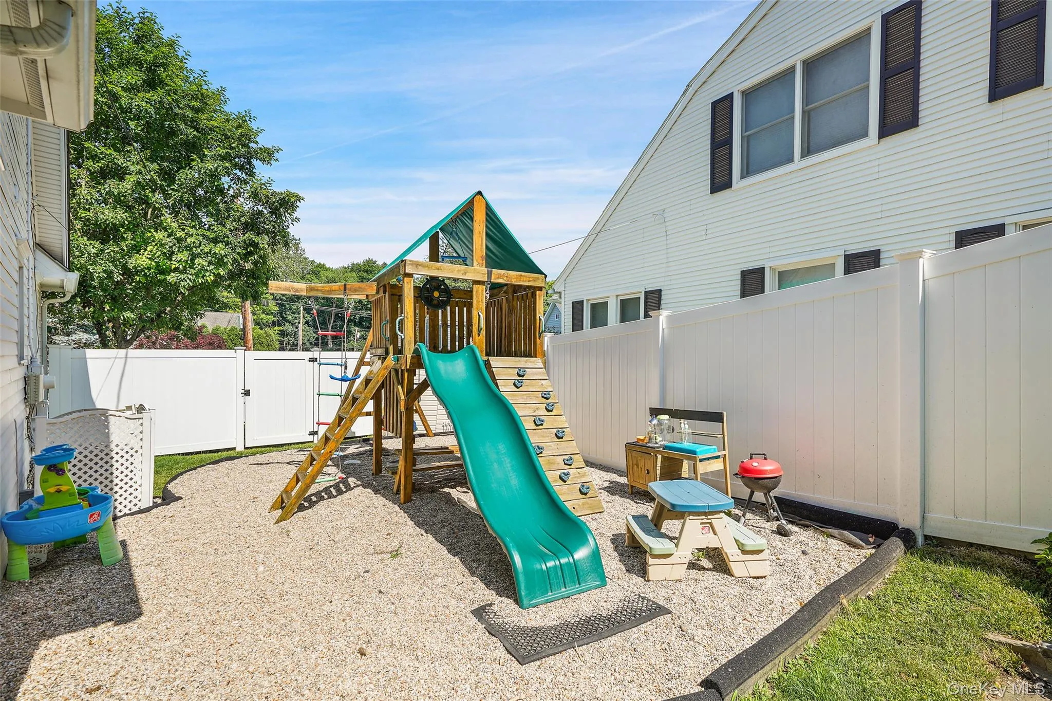 Playset on side of the house. Playset on side of the house.