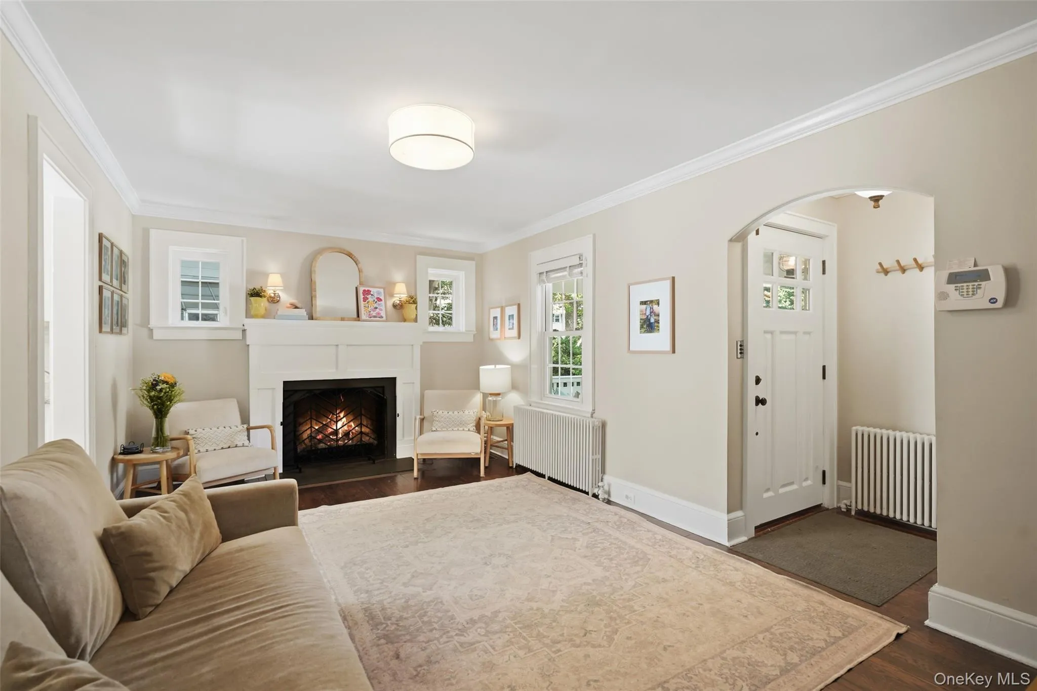 Living room with wood burning fireplace. Living room with wood burning fireplace.