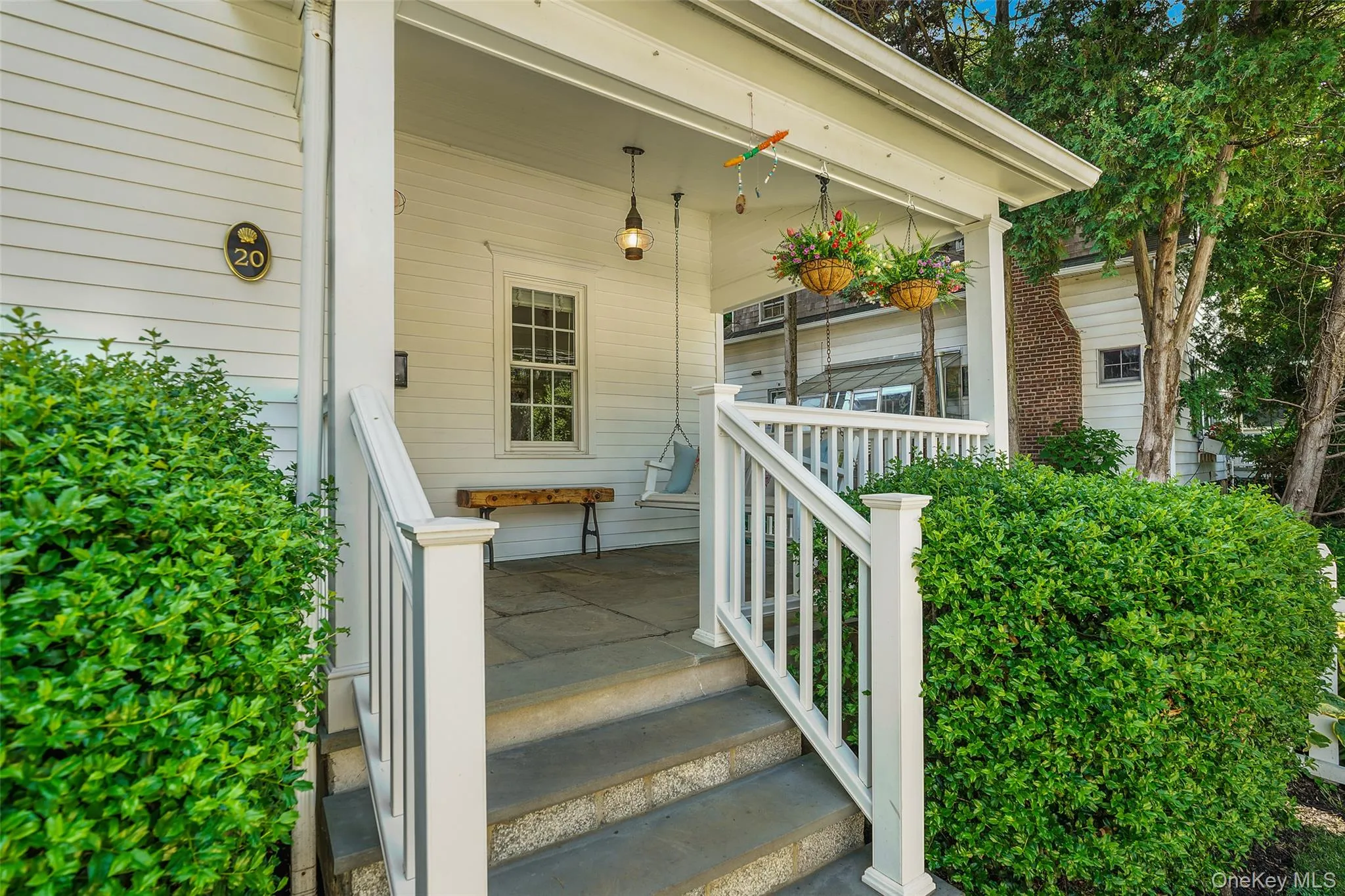 Front porch with bench swing. Front porch with bench swing.
