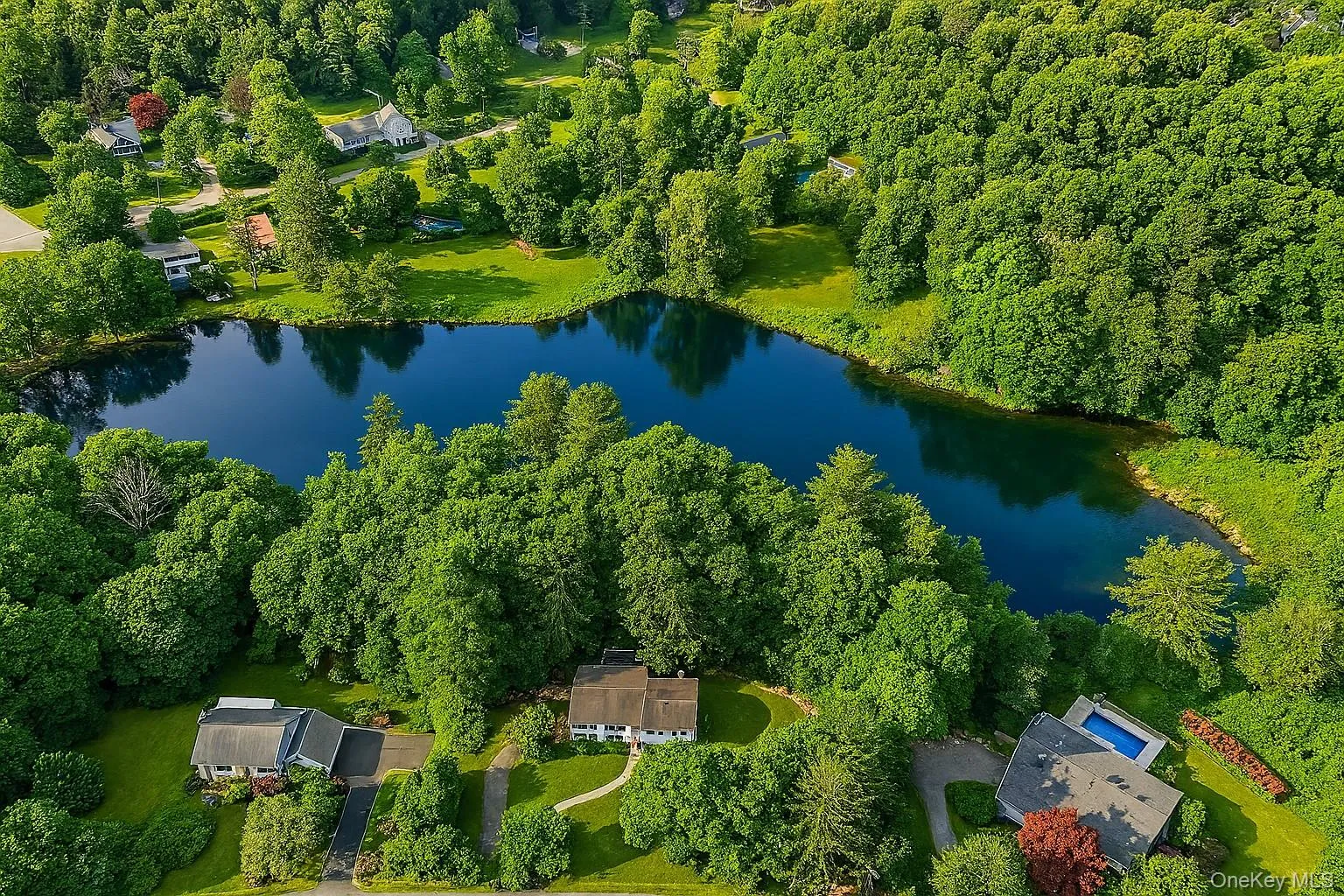 Ariel view of 5 Diane Court and lake. Ariel view of 5 Diane Court and lake.