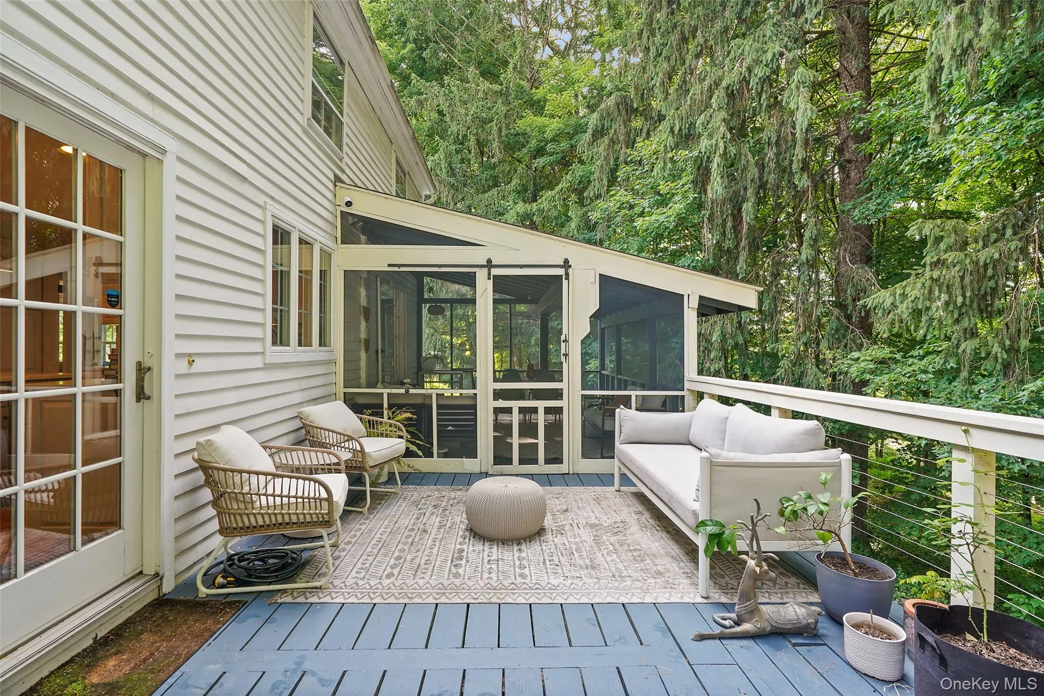 Deck with direct access to kitchen. Deck with direct access to kitchen.
