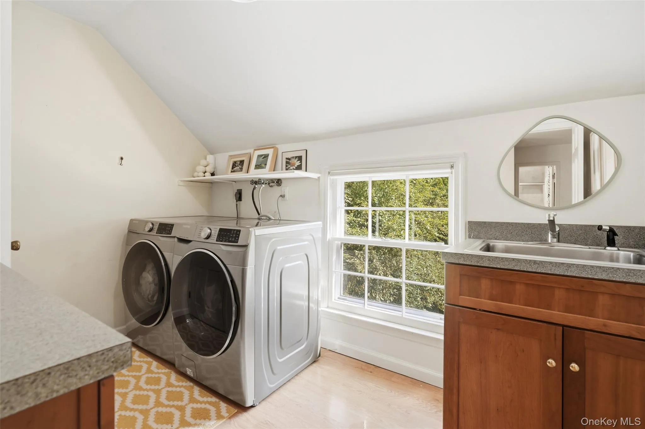 Laundry room with counter space. Laundry room with counter space.