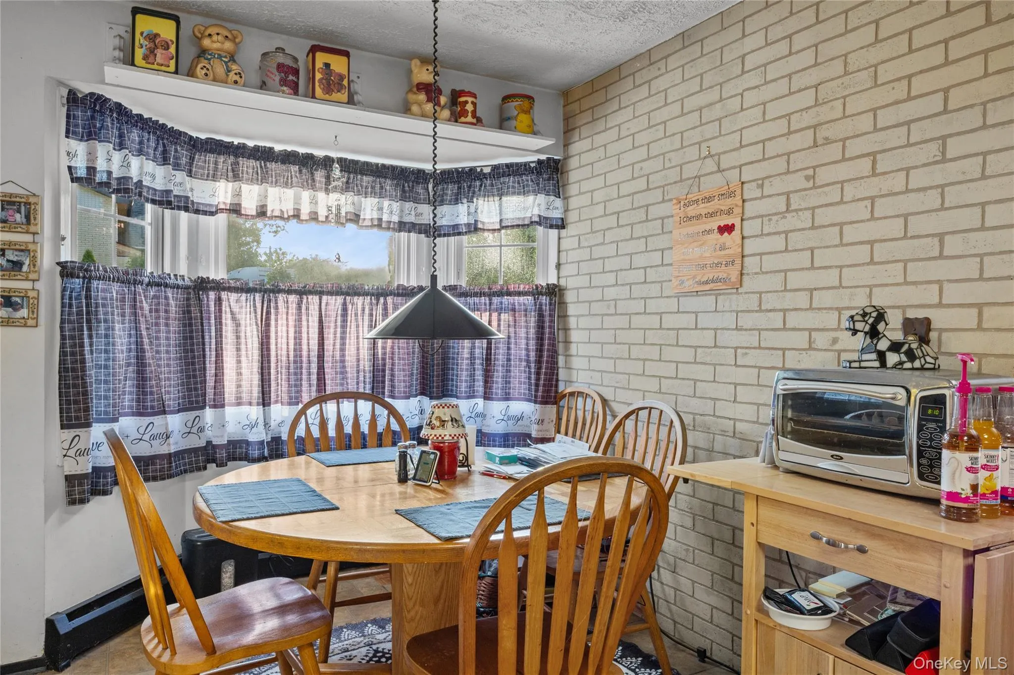 Dining area with a bay window Dining area with a bay window