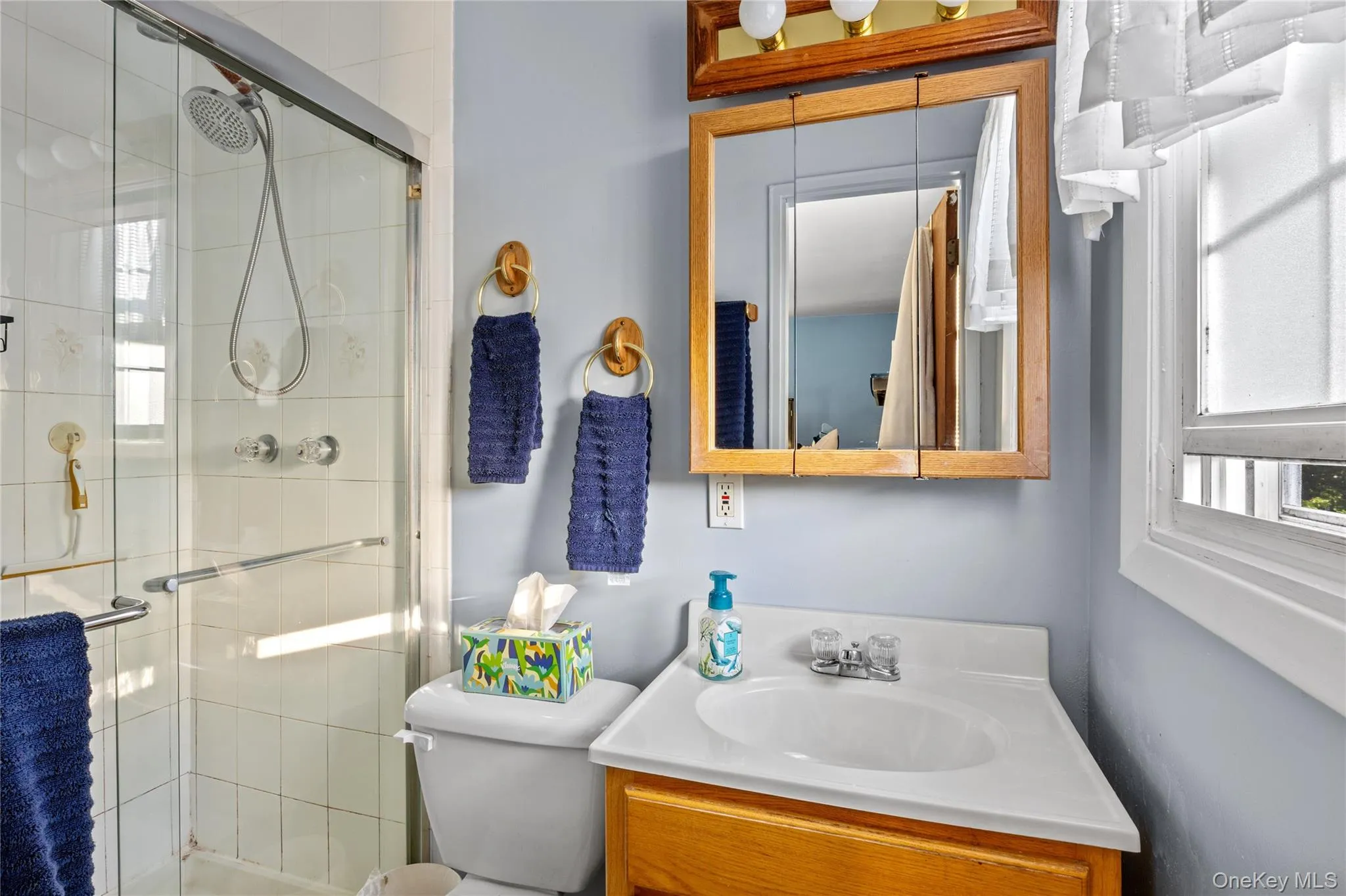 Primary Bathroom featuring a glass-enclosed shower Primary Bathroom featuring a glass-enclosed shower
