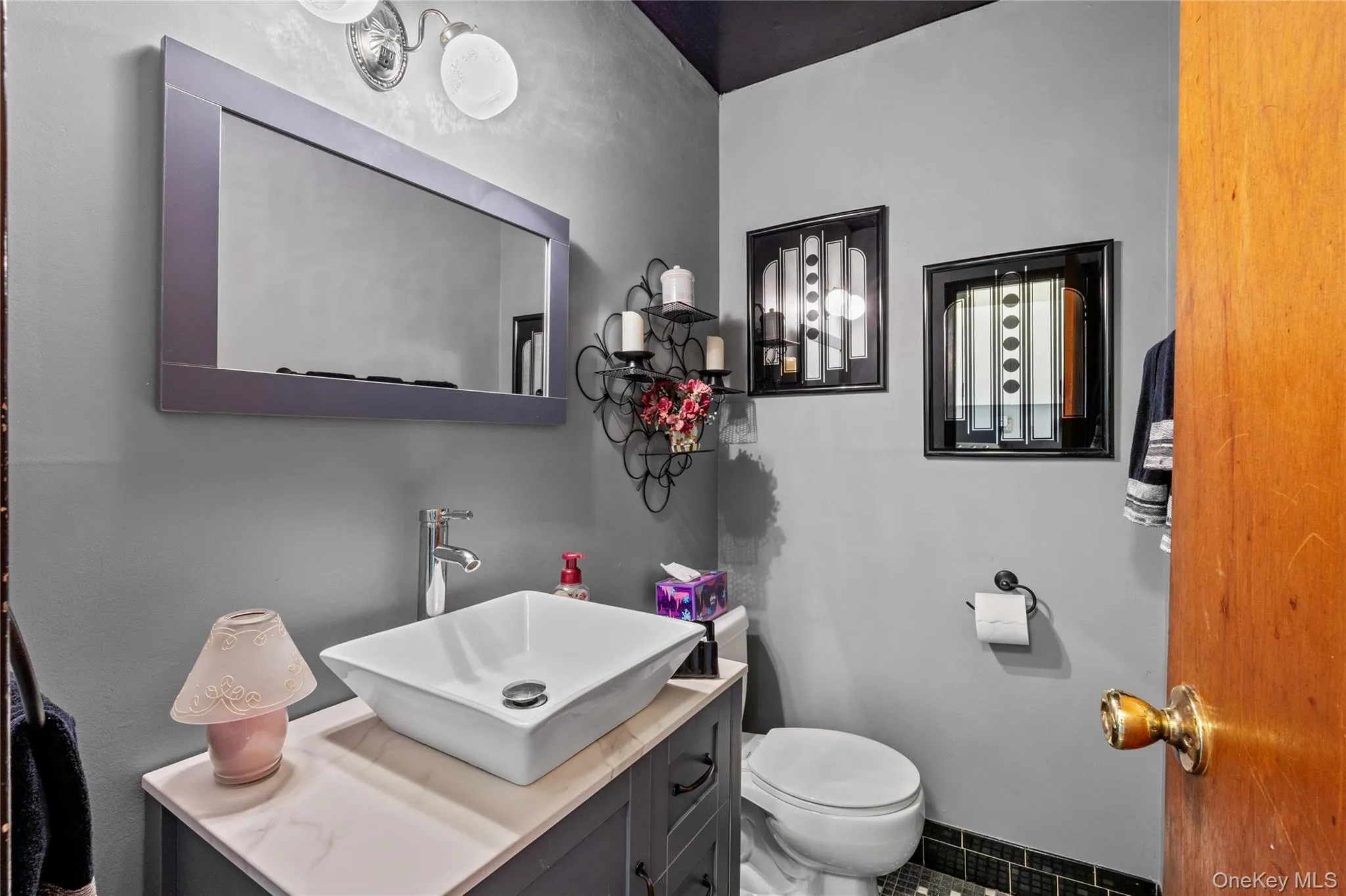 Powder Room with white vessel sink Powder Room with white vessel sink
