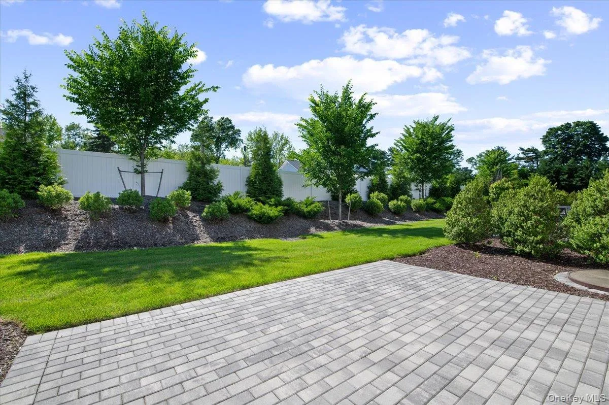 Large rear paver patio. Large rear paver patio.