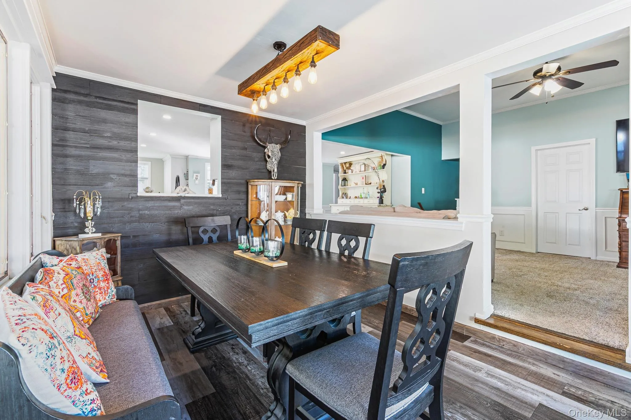 Off Of The Formal Living Room Is The Stunning Step Down Formal Dining Room Offering Walls Of Windows & Sliding Doors Overlooking The Backyard & In Ground Pool, Beautiful Moldings & Details, Accent Shiplap Wall With An Opening Into The Kitchen, Chandelier & Ample Room For A Good Sized Table & Chairs. This Room Would Also Make A Perfect Den/Sunroom With All Of It's Beautiful Windows & Access To The Backyard & Pool. Off Of The Formal Living Room Is The Stunning Step Down Formal Dining Room Offering Walls Of Windows & Sliding Doors Overlooking The Backyard & In Ground Pool, Beautiful Moldings & Details, Accent Shiplap Wall With An Opening Into The Kitchen, Chandelier & Ample Room For A Good Sized Table & Chairs. This Room Would Also Make A Perfect Den/Sunroom With All Of It's Beautiful Windows & Access To The Backyard & Pool.
