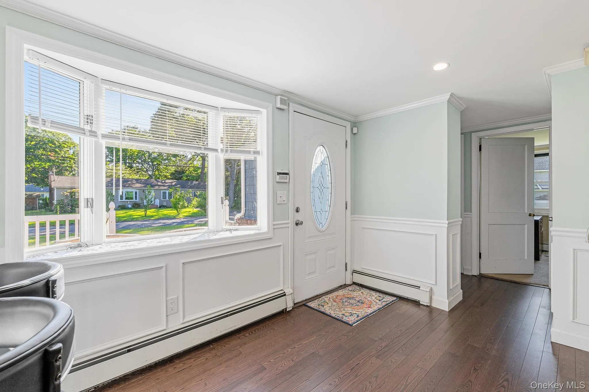 The Front Porch Leads Into The Welcoming Entrance Foyer Offering A Very Large Open Space For Greeting & Gathering. The Entrance Foyer Offers Beautiful Box Paneled/Wainscoted Walls, Custom Moldings, A Bay Window For Natural Light, And The Entrance Foyer/Gathering Space Opens Into The Kitchen & Into The Formal Living Room. The Front Porch Leads Into The Welcoming Entrance Foyer Offering A Very Large Open Space For Greeting & Gathering. The Entrance Foyer Offers Beautiful Box Paneled/Wainscoted Walls, Custom Moldings, A Bay Window For Natural Light, And The Entrance Foyer/Gathering Space Opens Into The Kitchen & Into The Formal Living Room.