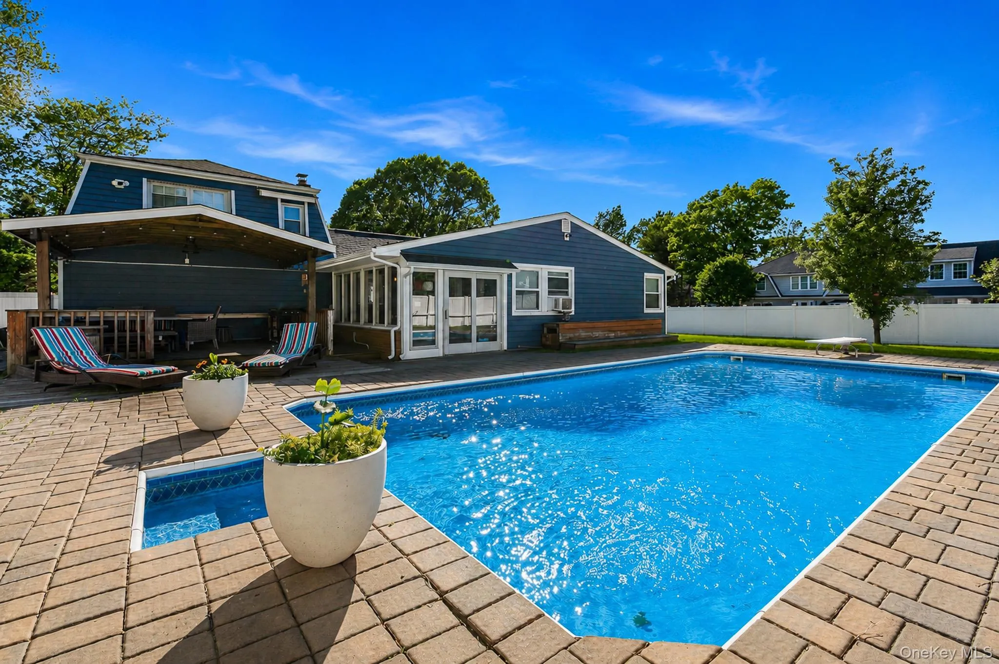 Another View Of The Spectacular Country Club Backyard Offering A Beautiful Saltwater In Ground Pool, Diving Board, Expansive Paver Patios & Paver Pool Surround, And A Wonderful Covered Deck - Perfect For Entertaining & Barbequing! Another View Of The Spectacular Country Club Backyard Offering A Beautiful Saltwater In Ground Pool, Diving Board, Expansive Paver Patios & Paver Pool Surround, And A Wonderful Covered Deck - Perfect For Entertaining & Barbequing!