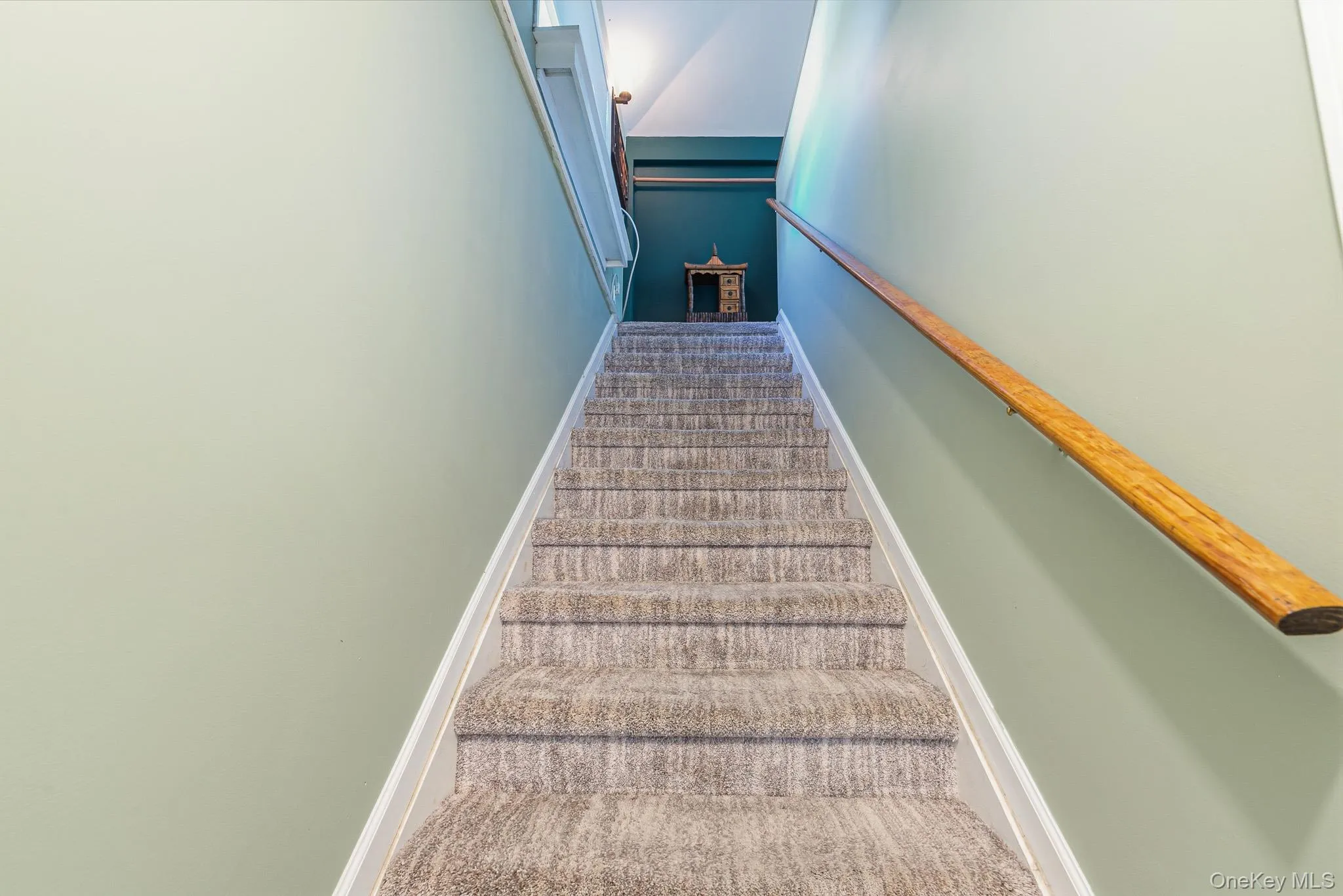 A Lovely Stairway Off Of The Kitchen Leads To The Stunning Primary Bedroom Suite. A Lovely Stairway Off Of The Kitchen Leads To The Stunning Primary Bedroom Suite.