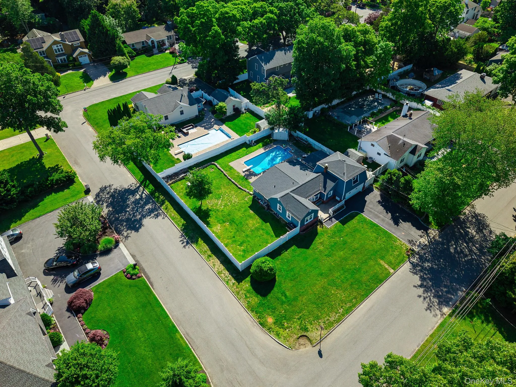 Aerial View Showing The Large Corner Property With A Very Large, Fully PVC Fenced Backyard & The Saltwater In Ground Pool. Aerial View Showing The Large Corner Property With A Very Large, Fully PVC Fenced Backyard & The Saltwater In Ground Pool.