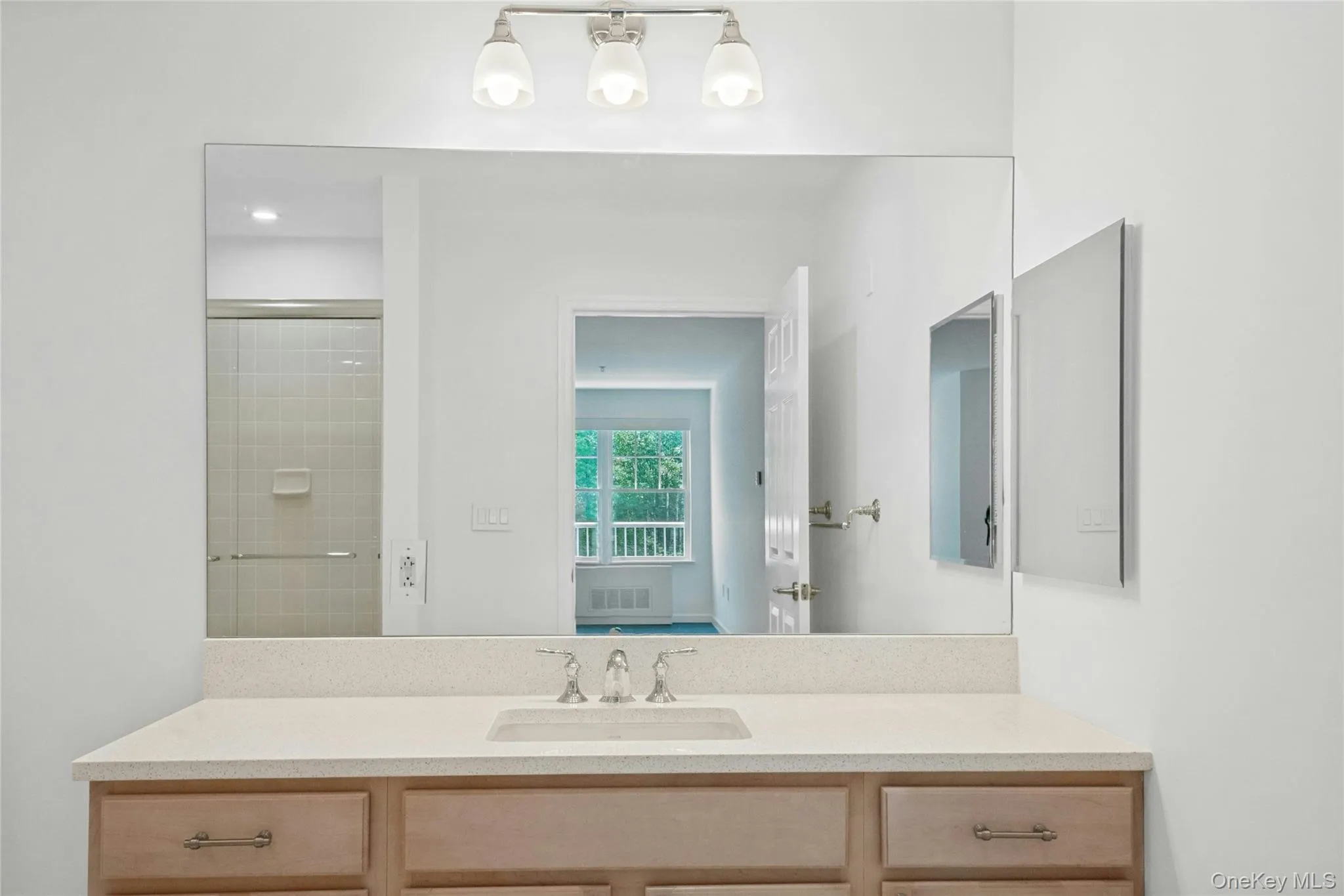 Oversized light wood vanity with new quartz countertops, under mount porcelain sink and Kohler Faucet Oversized light wood vanity with new quartz countertops, under mount porcelain sink and Kohler Faucet