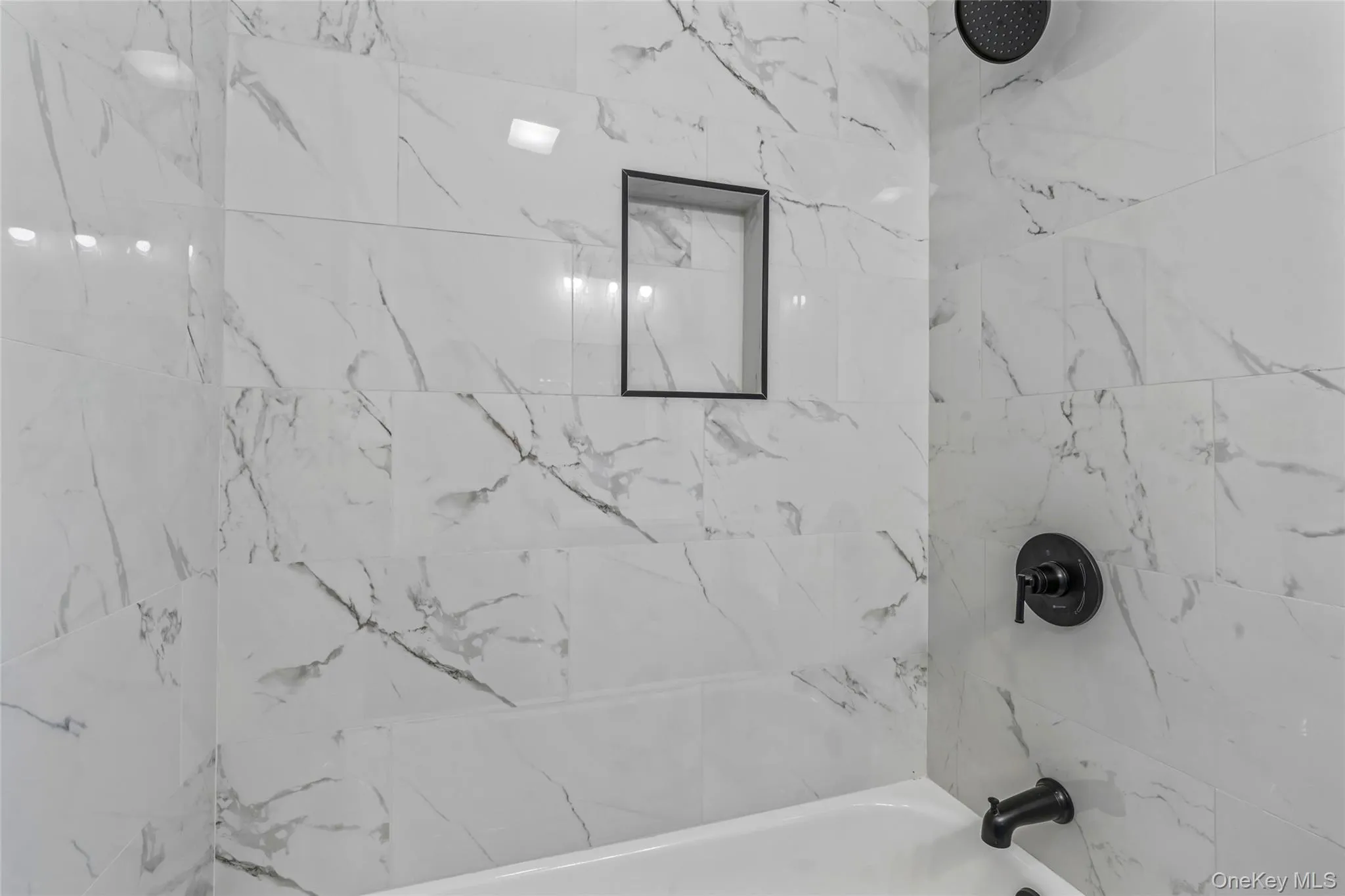 Full bath featuring shower / washtub combination Full bath featuring shower / washtub combination