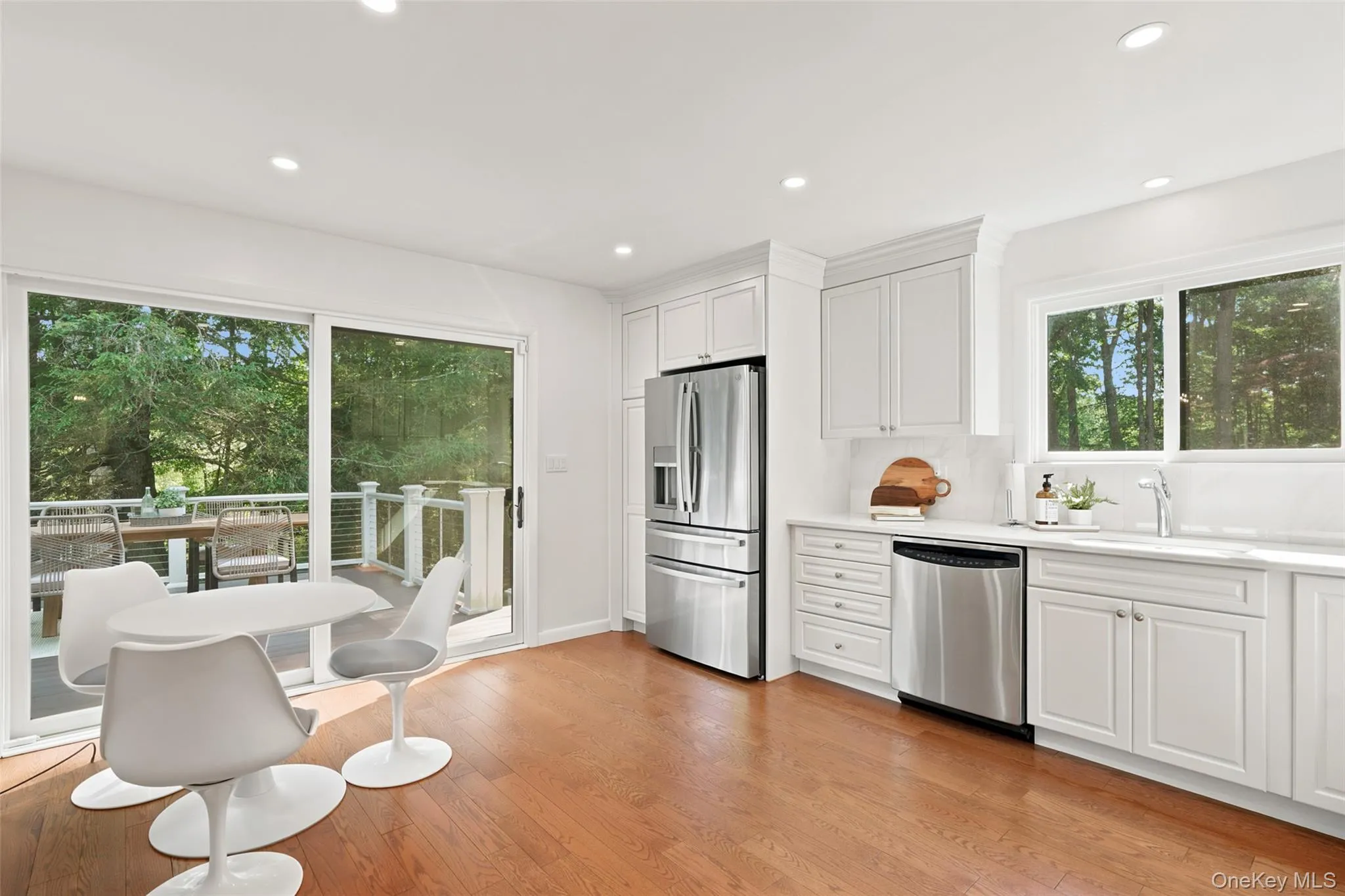 Eat in Kitchen renovated kitchen flows onto the expansive new deck Eat in Kitchen renovated kitchen flows onto the expansive new deck