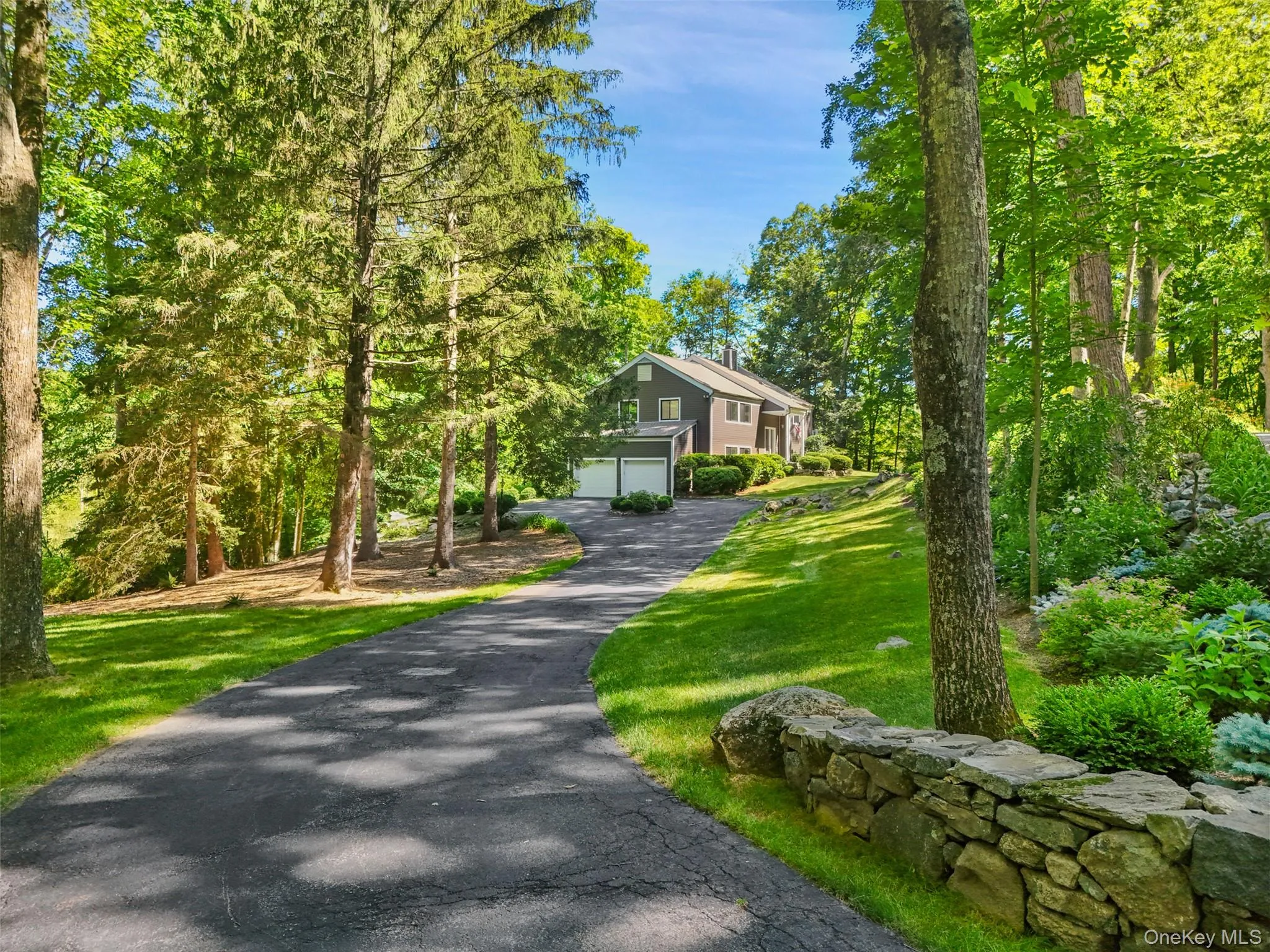 Long driveway leads to your four acre oasis Long driveway leads to your four acre oasis