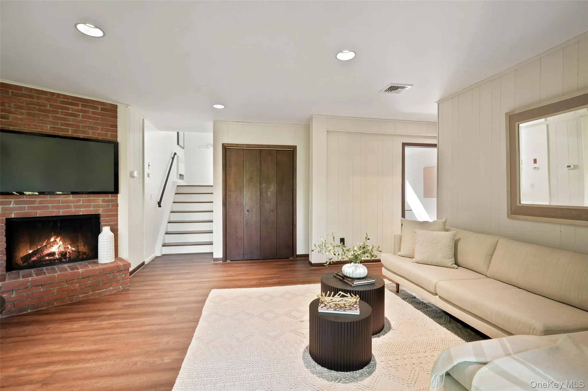 Lower level Great room with woodburning fireplace Lower level Great room with woodburning fireplace