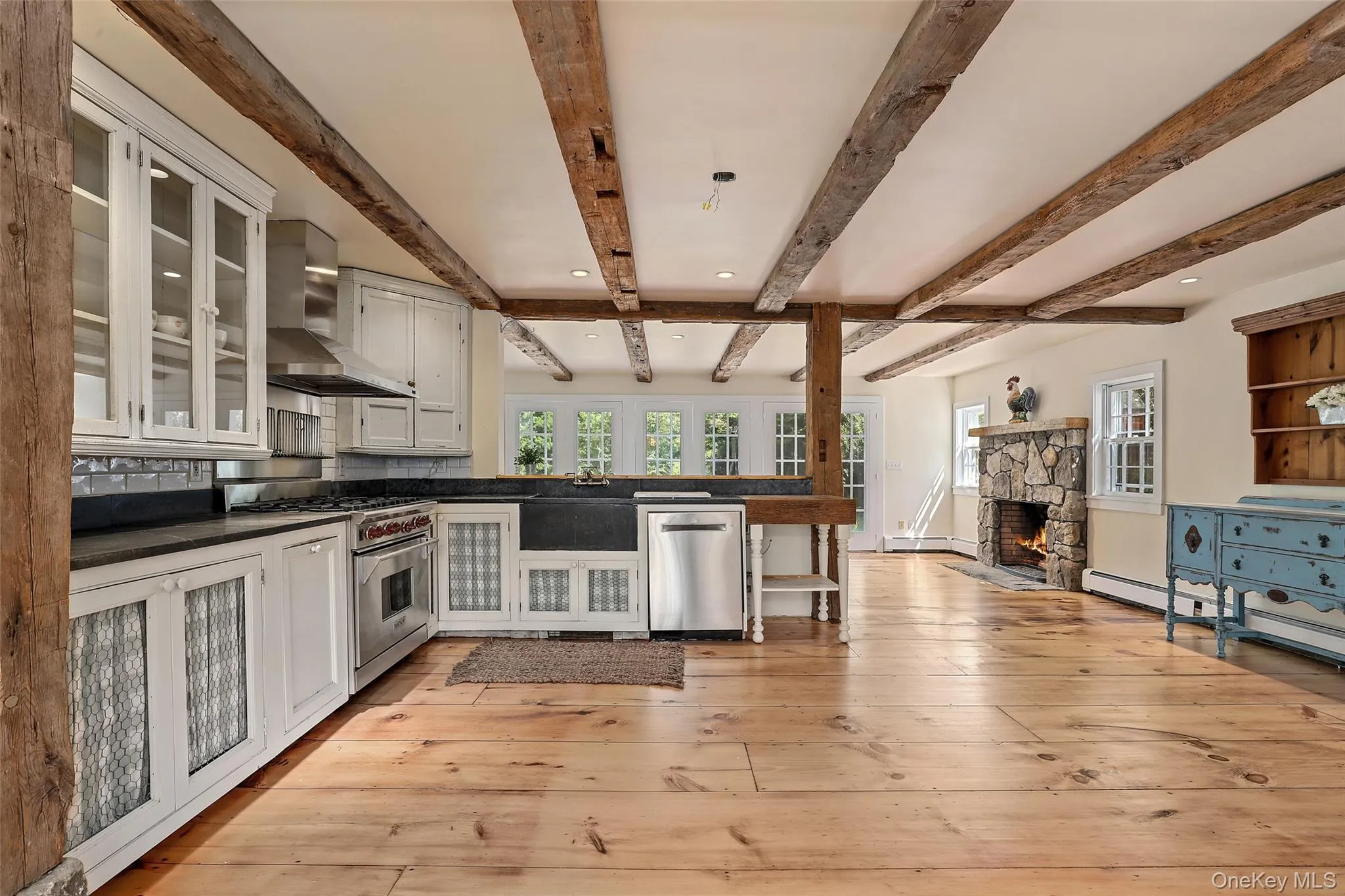 Original wide plank wood floors and beams. Original wide plank wood floors and beams.