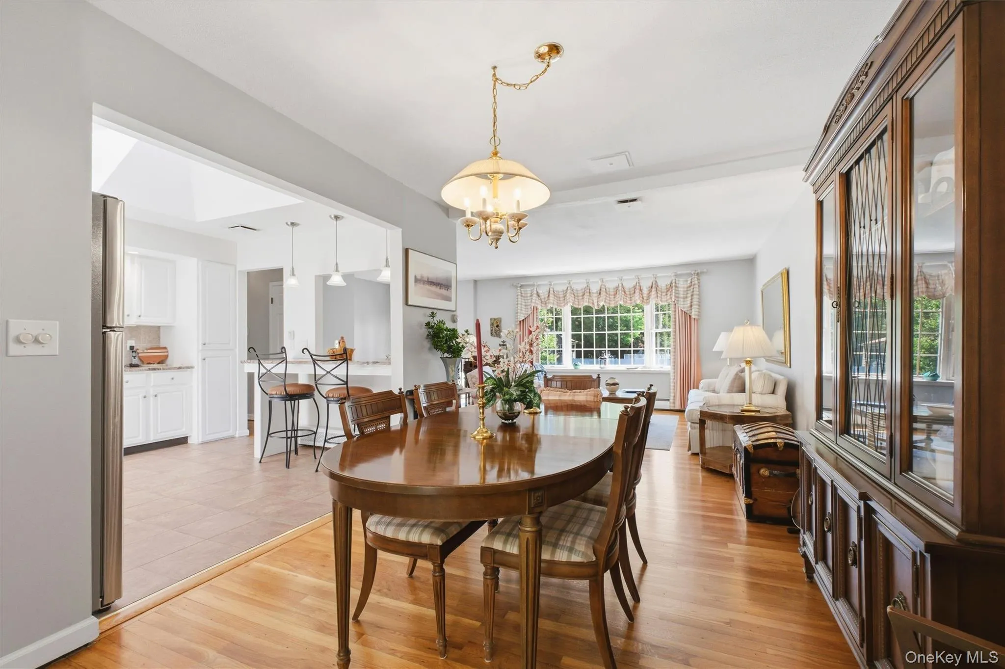 Dining room opens up to very large sunroom for relaxing Dining room opens up to very large sunroom for relaxing